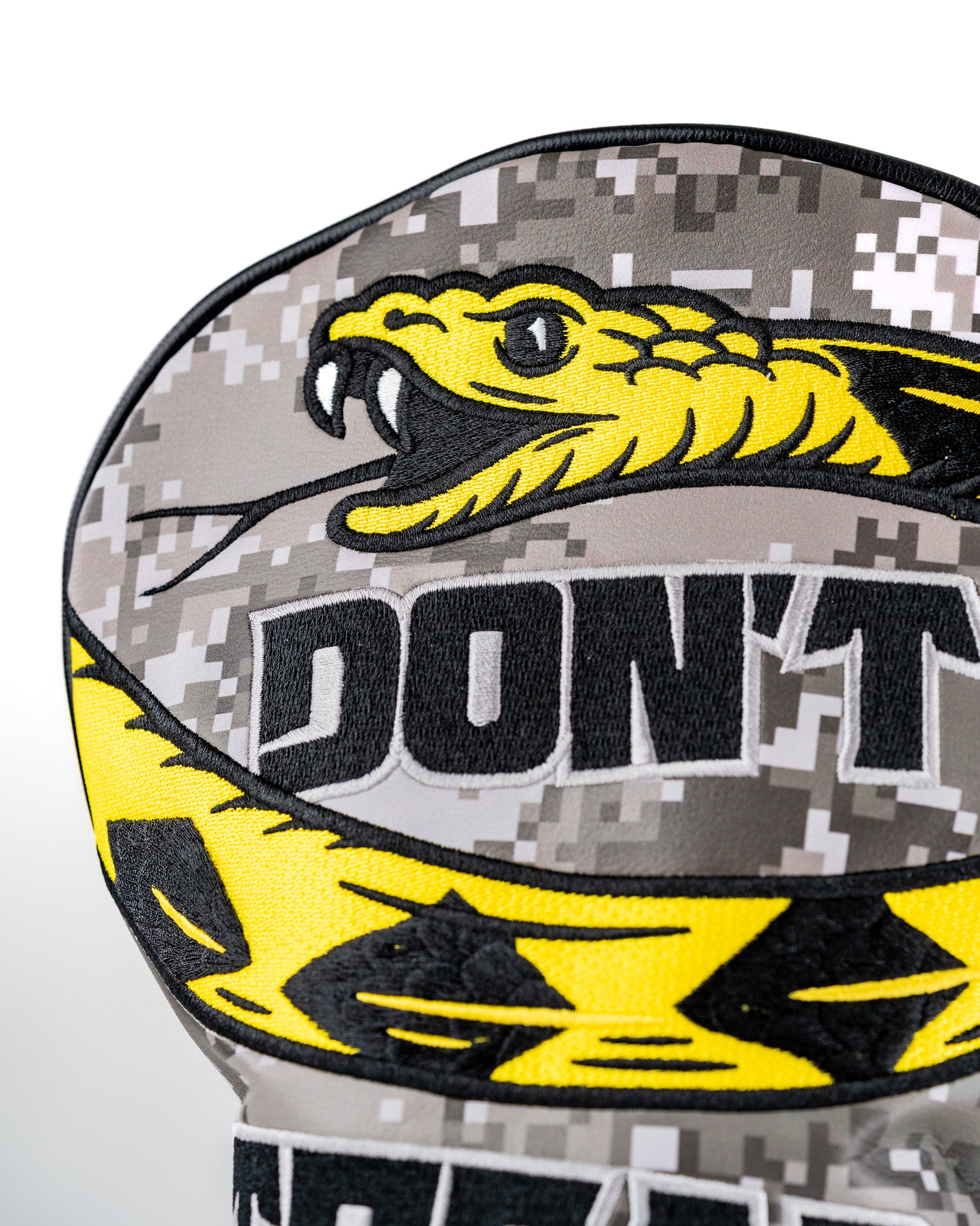 Bold Don't Tread On Me 2.0 headcover set featuring a striking yellow snake design on a camouflage background.