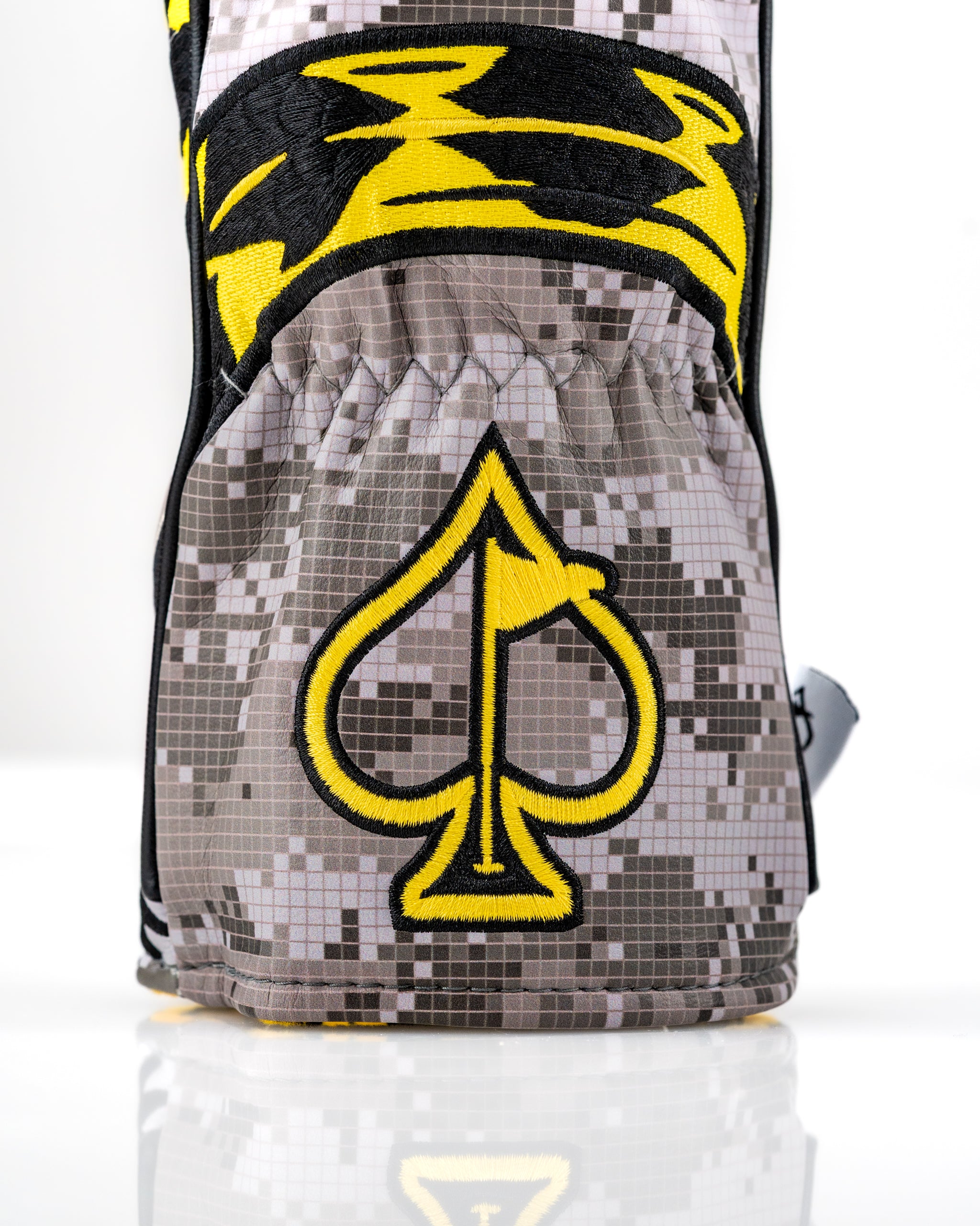 Bold Don't Tread On Me 2.0 headcover set featuring a striking spade design in yellow and gray camo pattern.