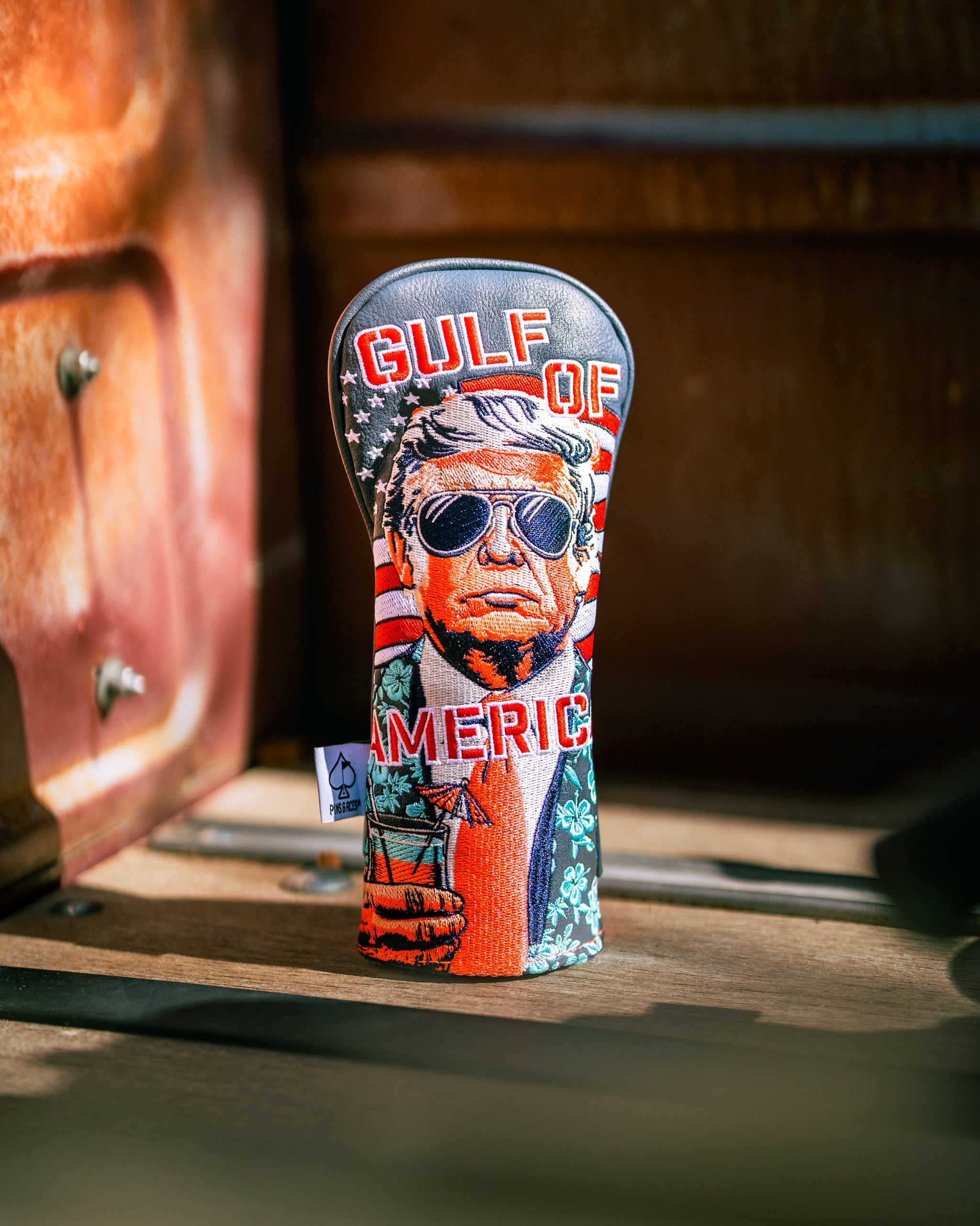 Bold golf hybrid cover featuring a graphic of a man in sunglasses with "Gulf of America" text, perfect for standout style on the course.