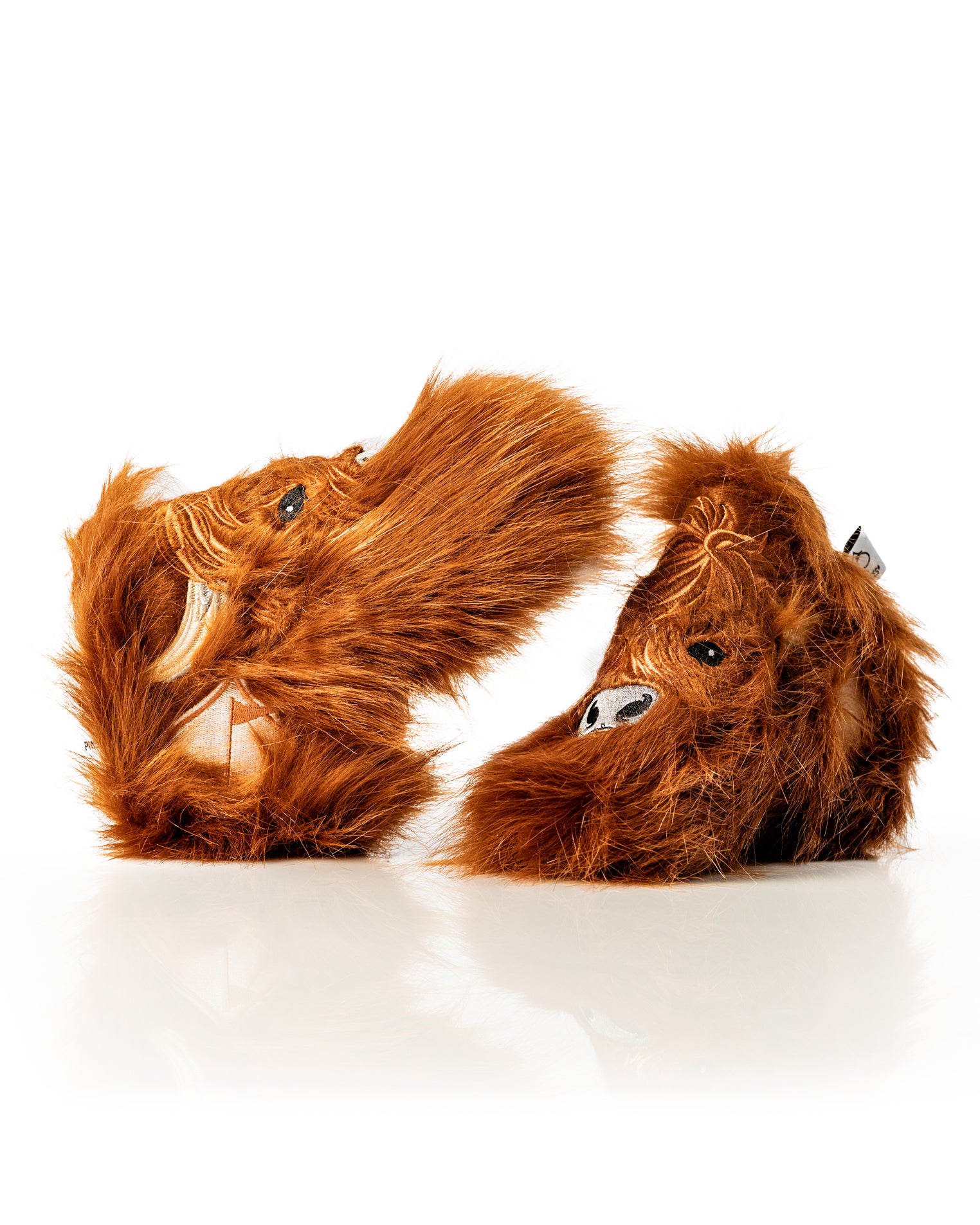 Highland cow blade putter cover featuring a textured, furry design for a unique and playful golf accessory.