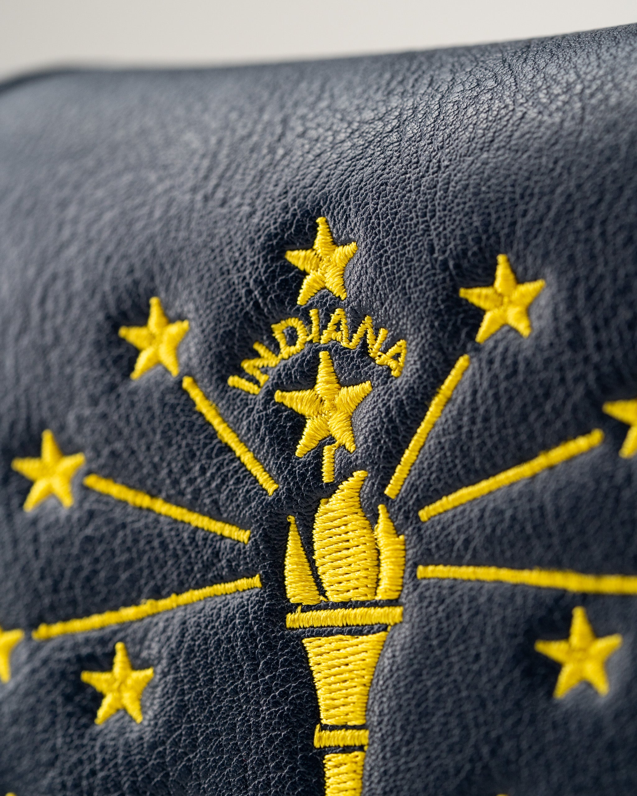 Indiana State Flag mallet putter cover featuring vibrant yellow embroidery on a navy background, showcasing the state emblem.