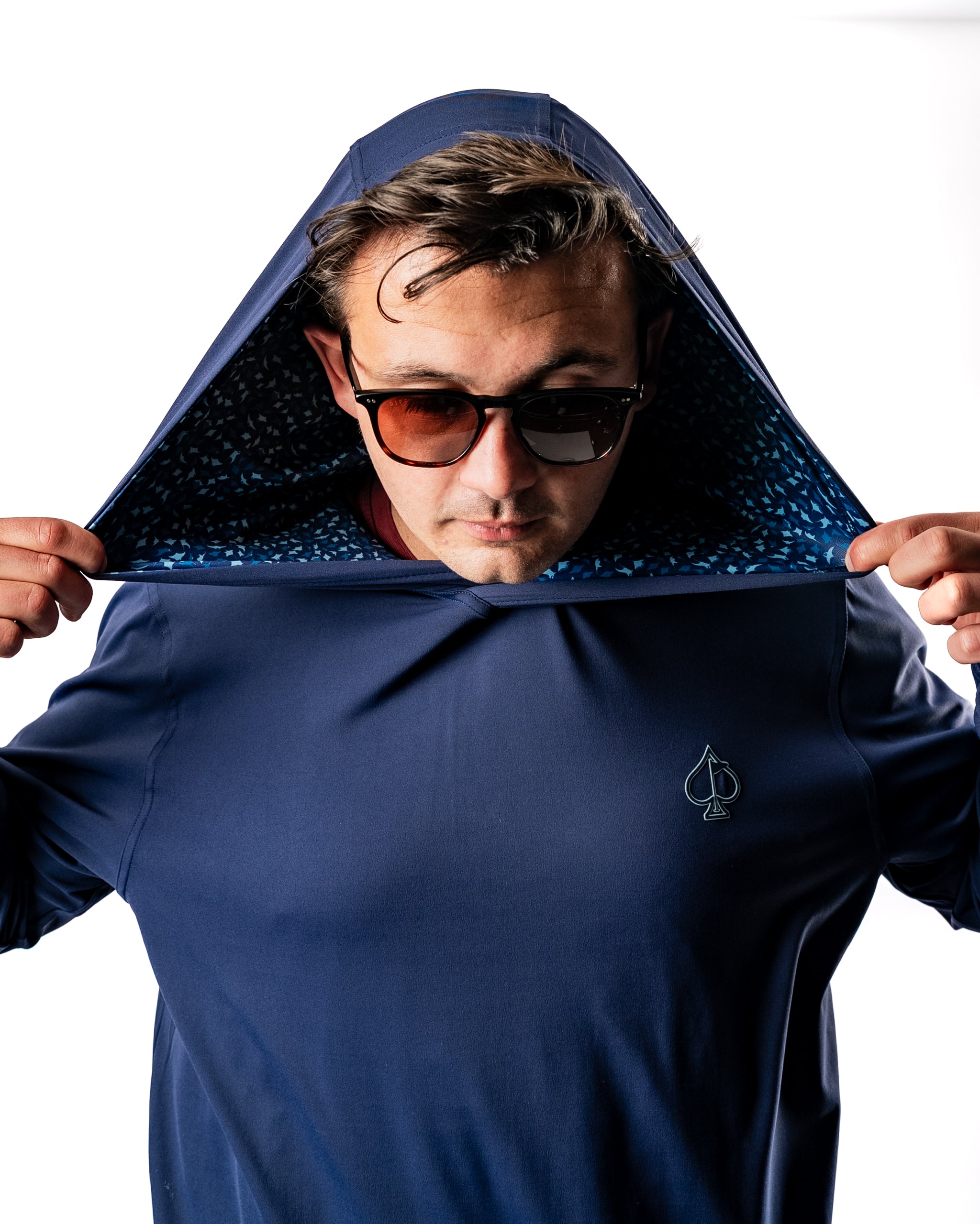 Performance Golf Hoodie in Manta Ray design, featuring a stylish hood and unique interior pattern, perfect for golfers.
