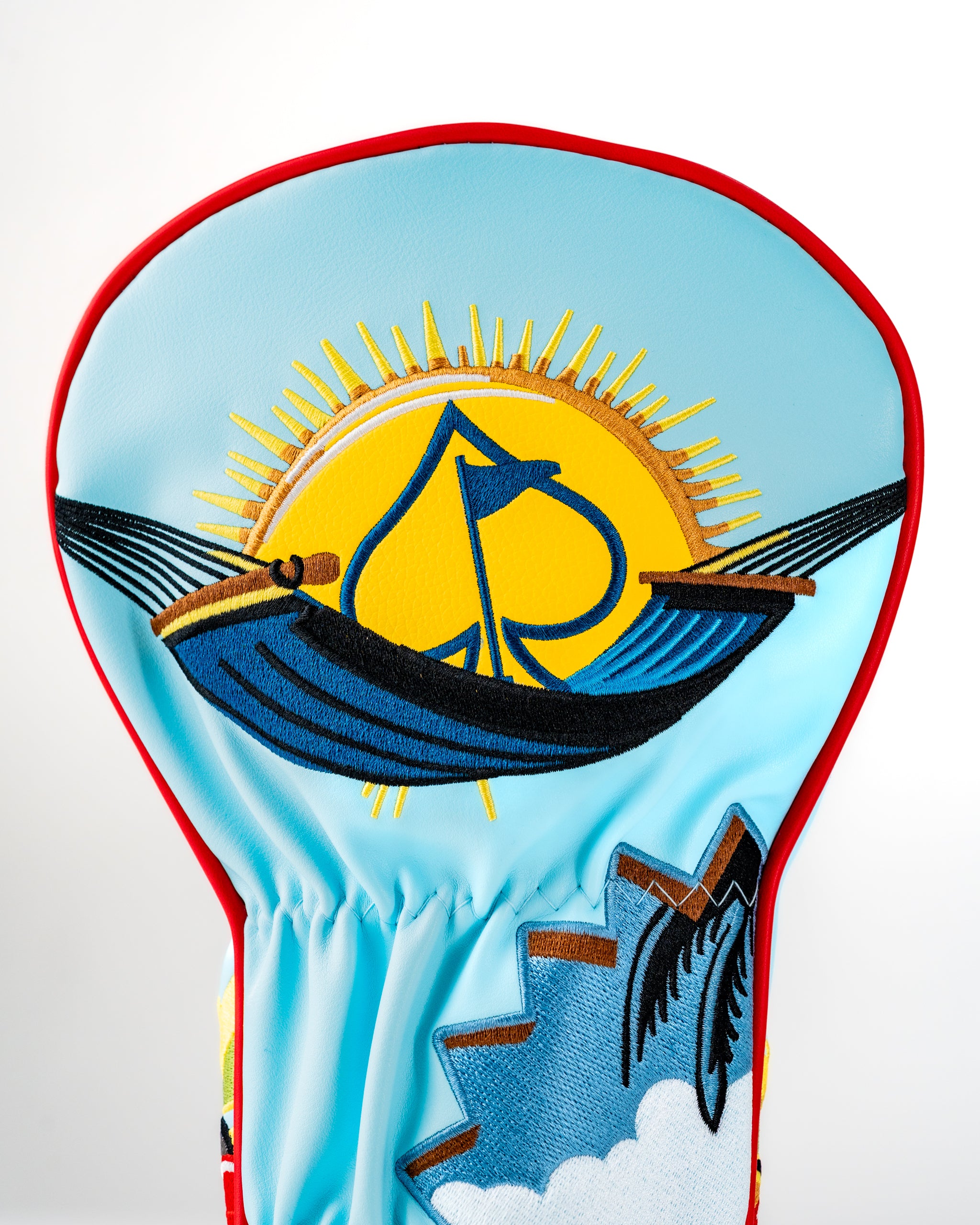 Margaritaville x Pins & Aces headcover set featuring vibrant beach-themed designs with sun, waves, and palm trees.