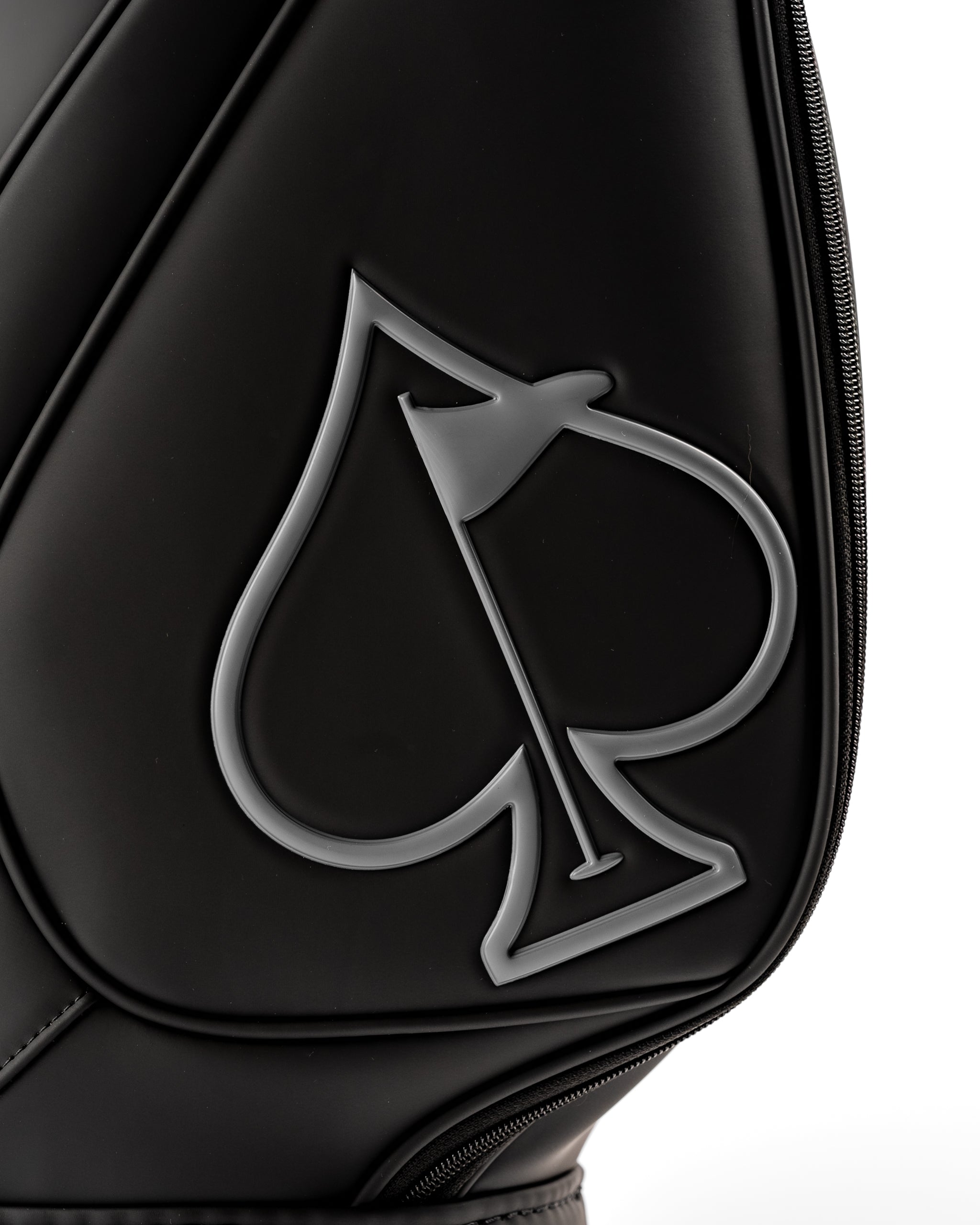 Sleek black Den Caddy with a prominent spade logo, designed for stylish golfers seeking unique accessories.