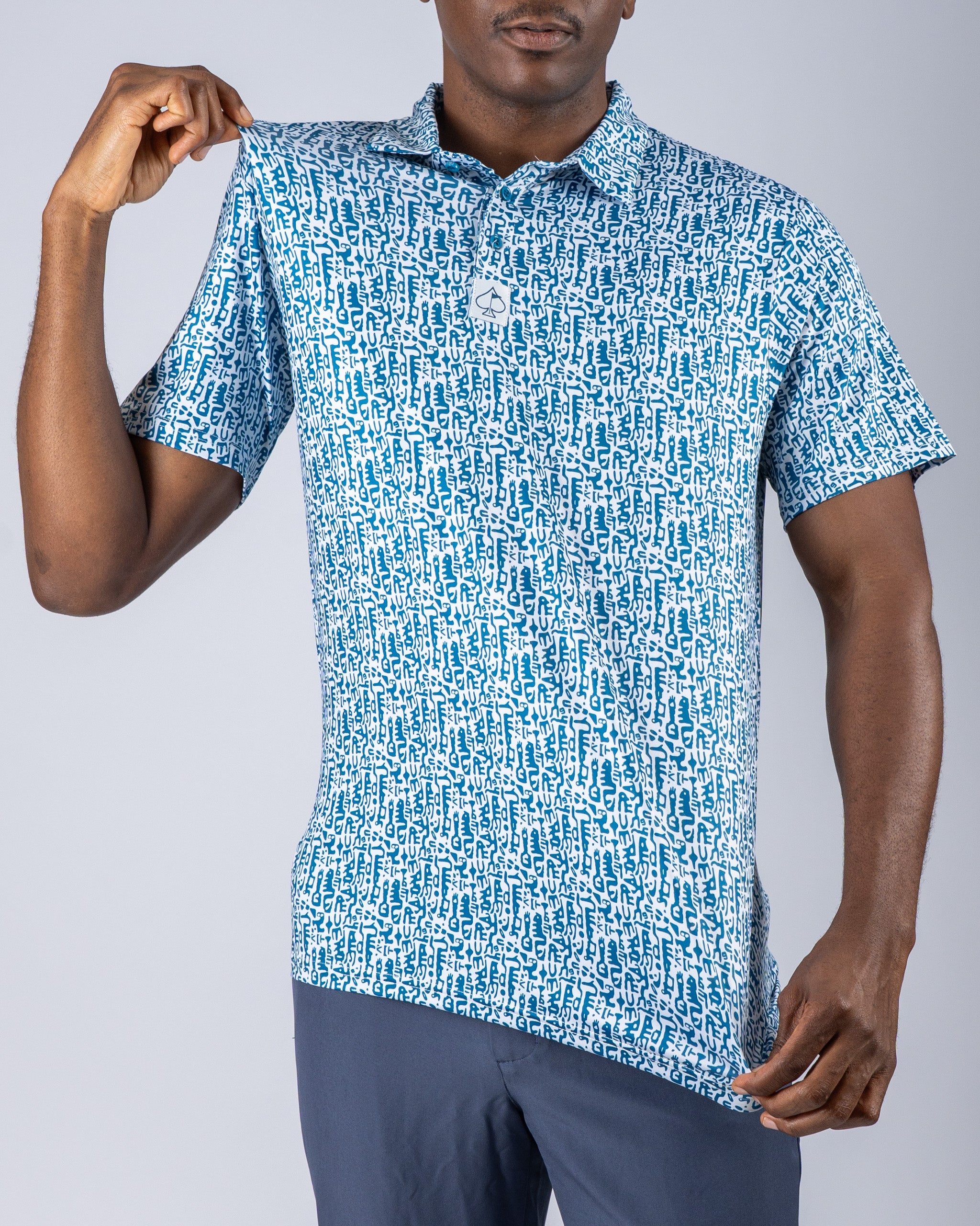 Men's Maze Craze golf polo featuring a bold, abstract pattern in blue and white, designed for stylish performance on the course.