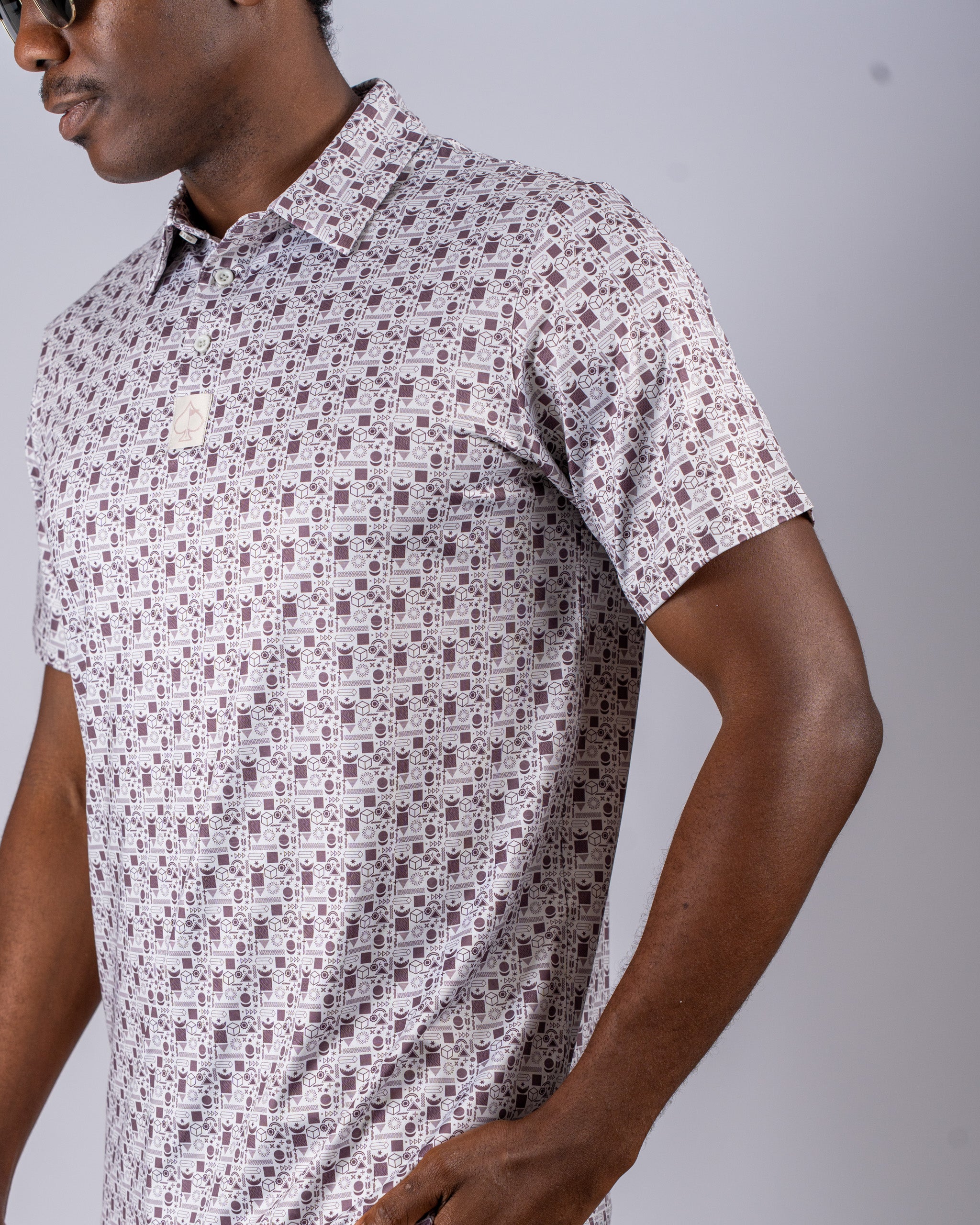 Men's retro golf shirt featuring a unique geometric pattern, perfect for stylish performance on the course.