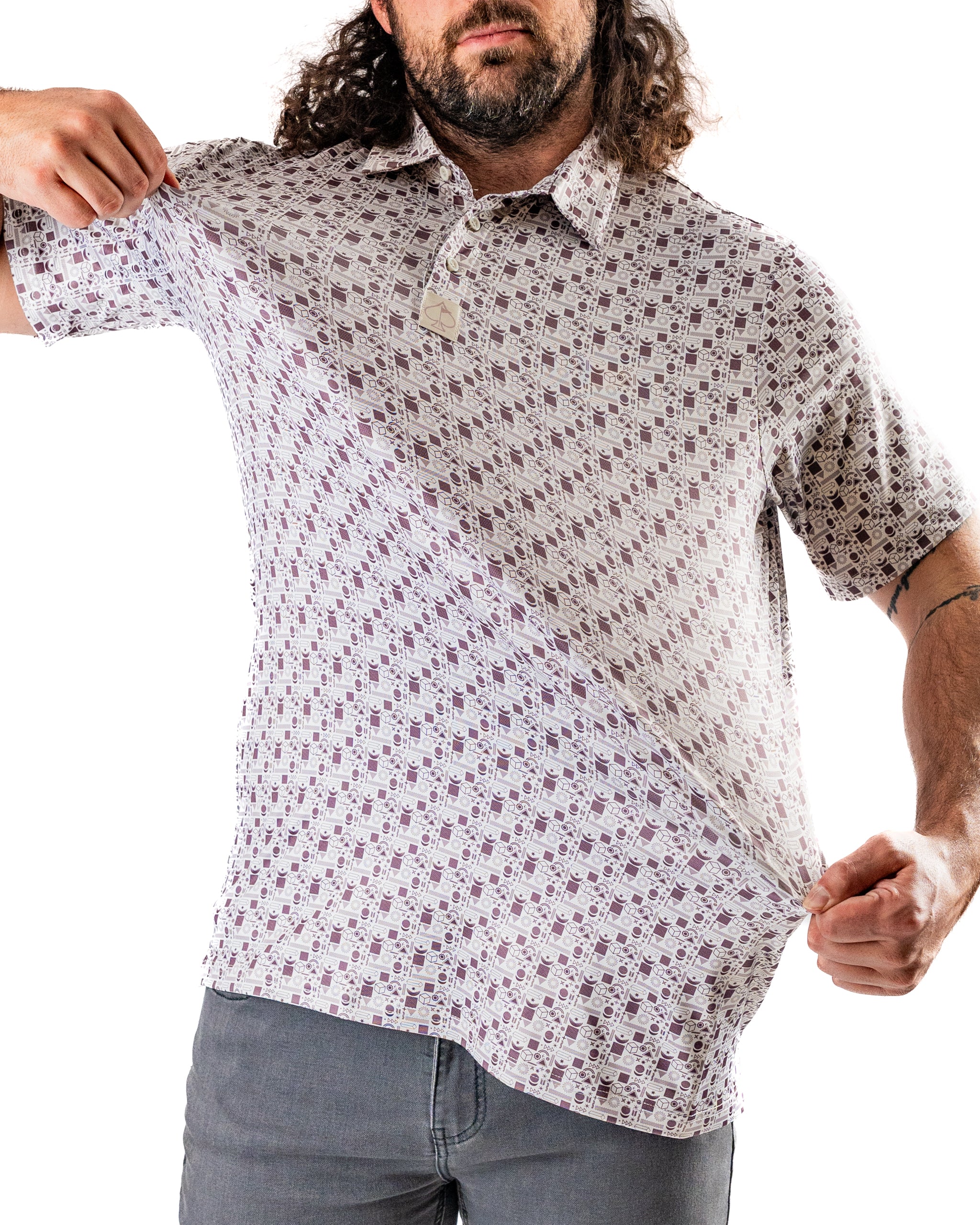 Man showcasing the Retro Form golf shirt with a unique patterned design, emphasizing its bold style and comfort.