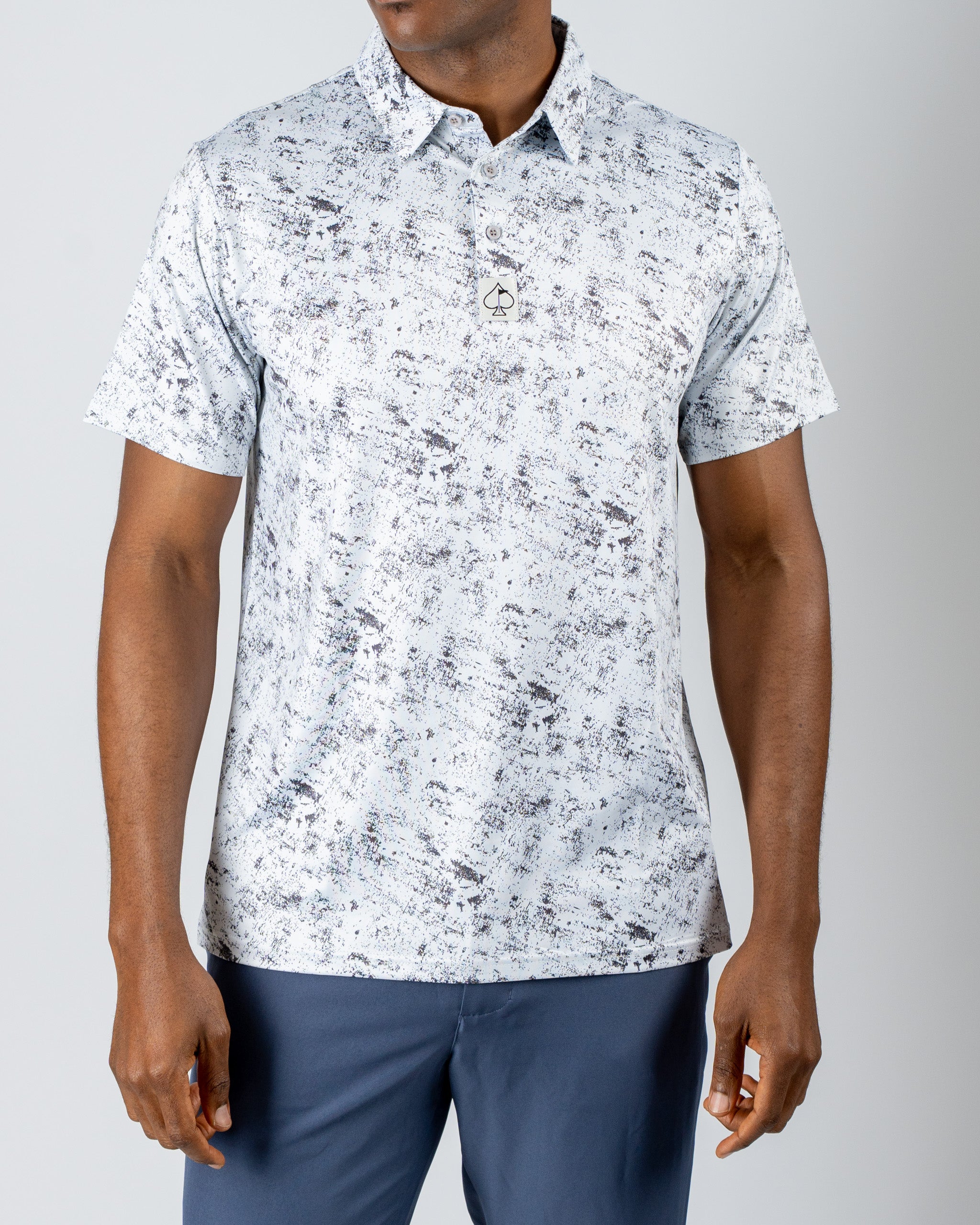 Men's short-sleeve golf shirt in a white and gray abstract pattern, featuring a collar and a logo on the chest.