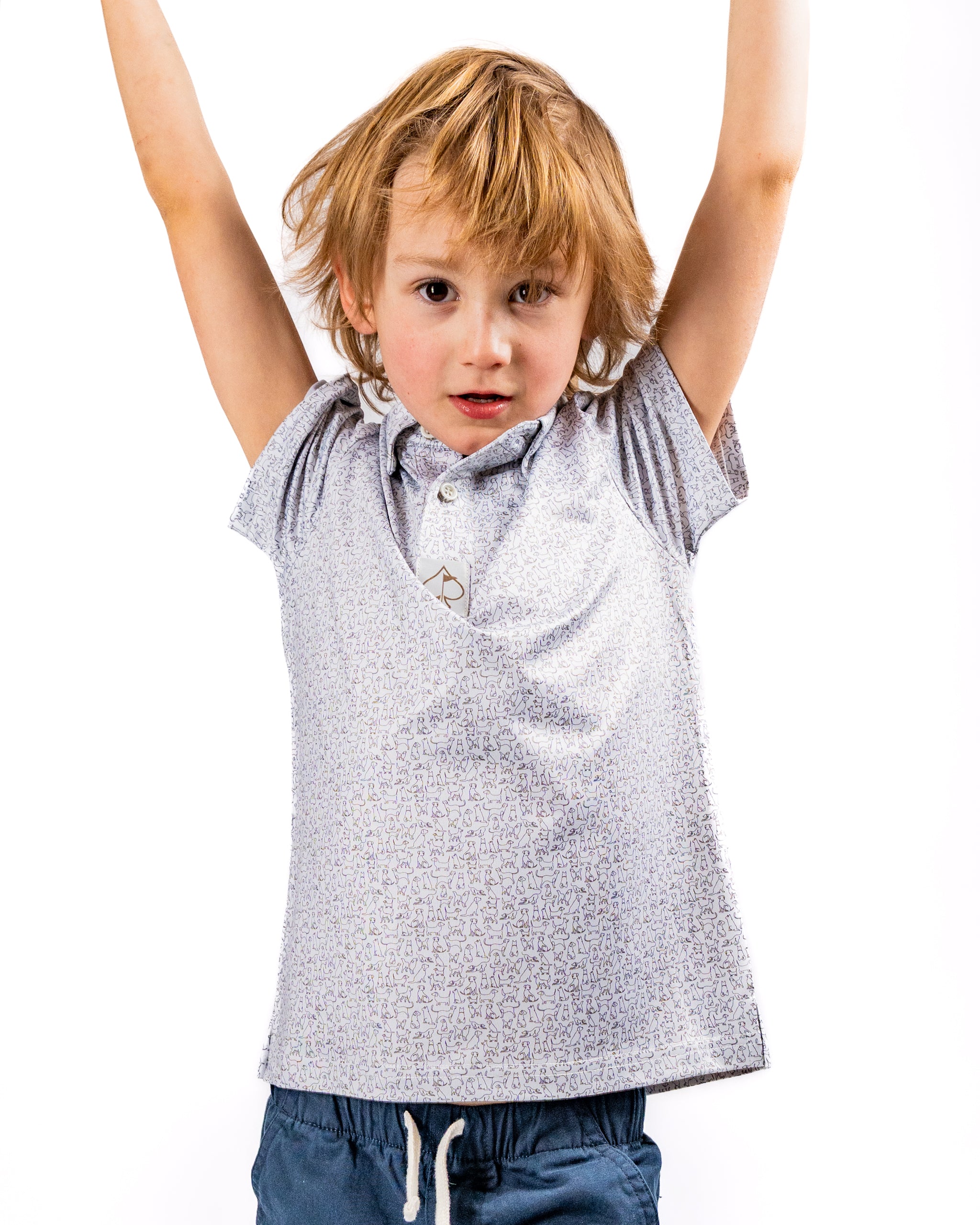 Youth Best Friend Light shirt on a boy with raised arms, showcasing a playful design perfect for active kids.