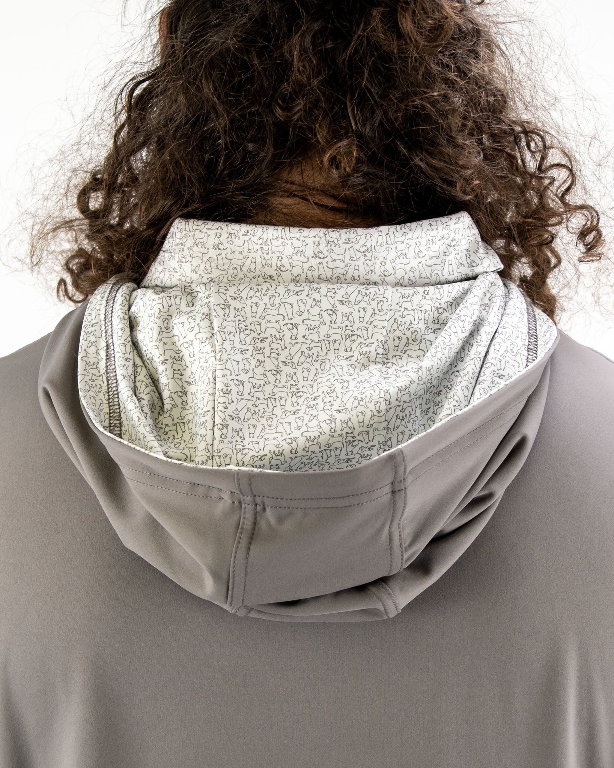 Men's performance golf hoodie featuring a unique dog-themed interior lining and a comfortable, stylish design.