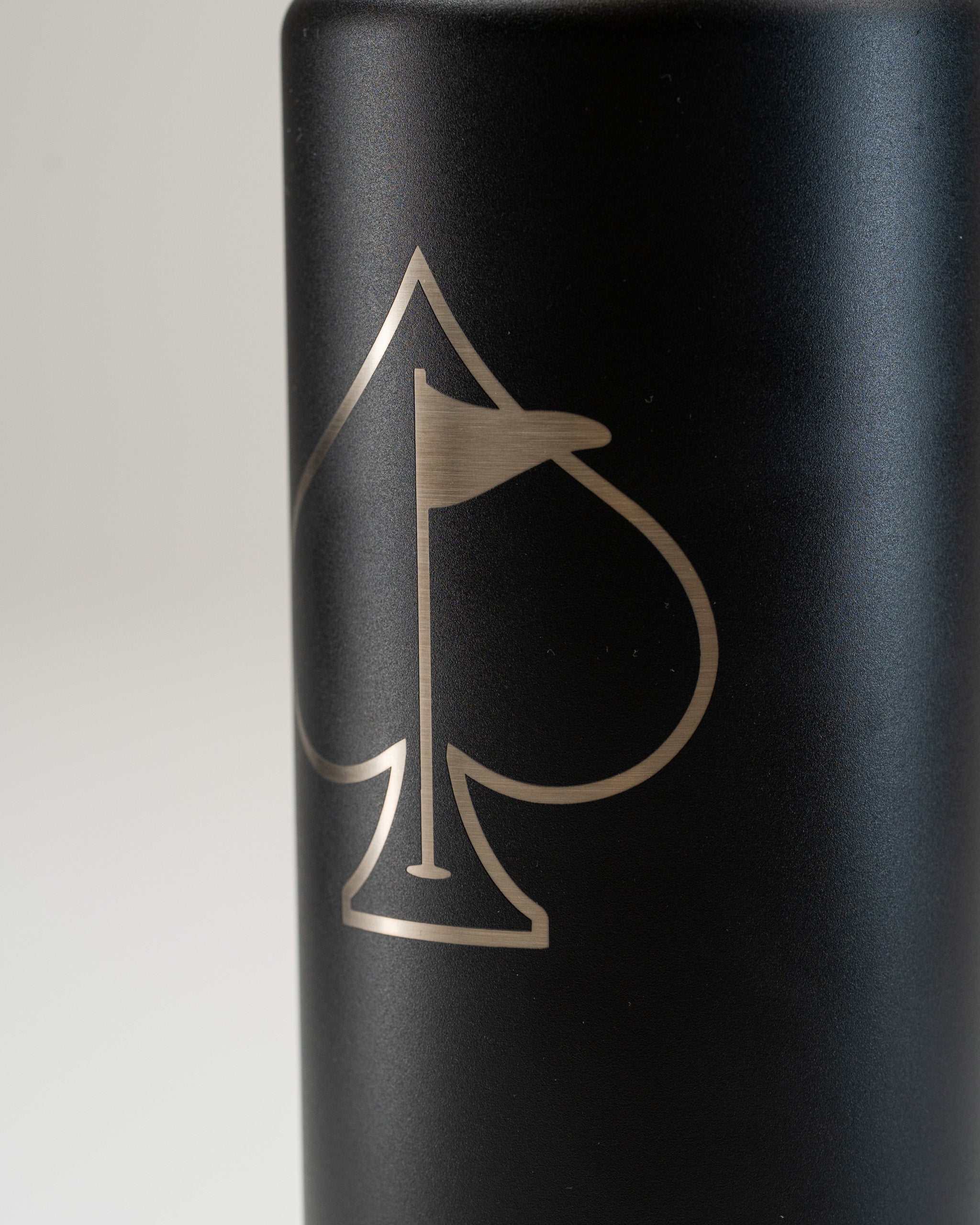 Sleek black Yeti Rambler with a golf-themed logo, featuring a chug cap for easy sipping on the course.
