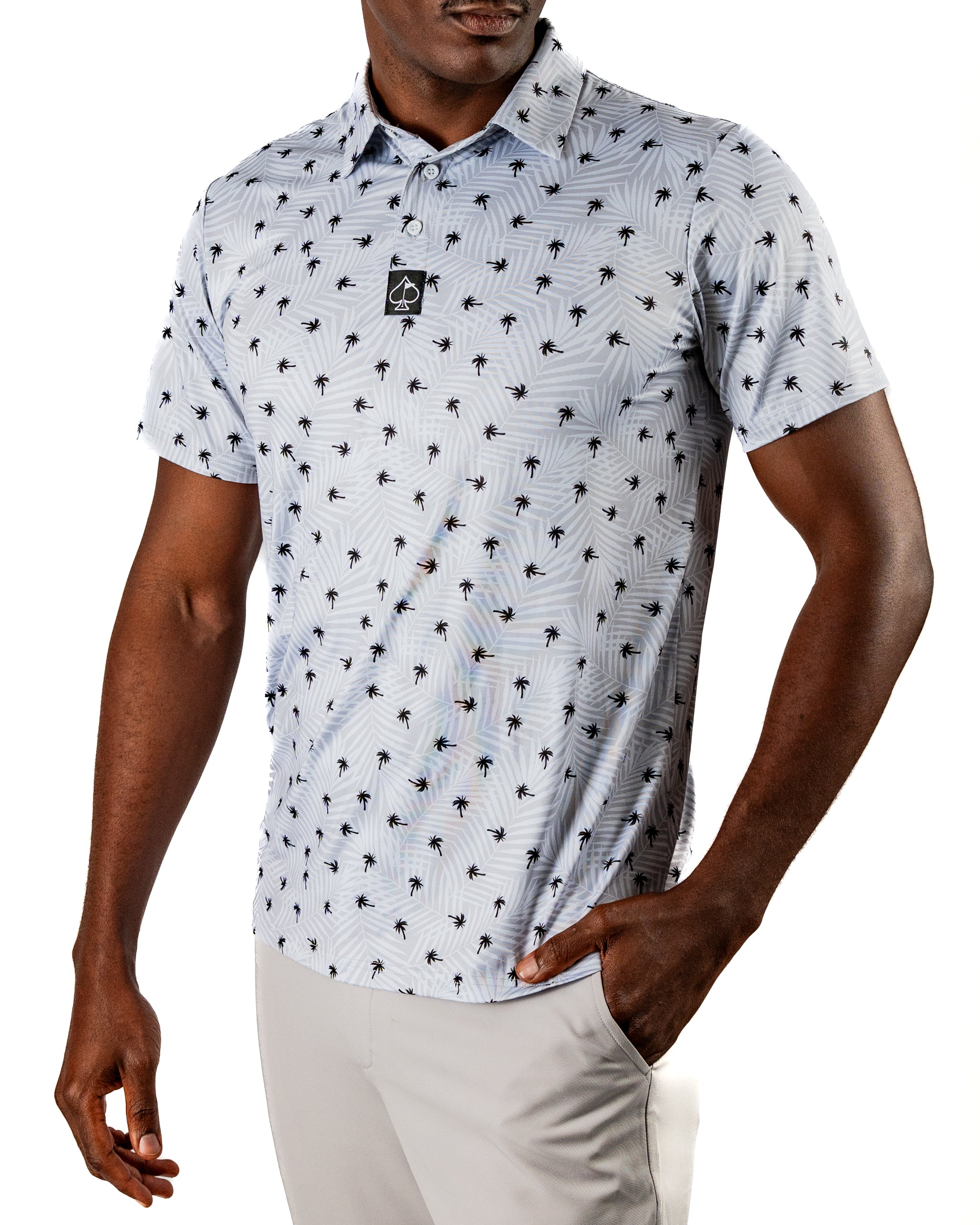 Men's golf polo shirt featuring a light blue palm tree pattern, perfect for stylish comfort on the course.