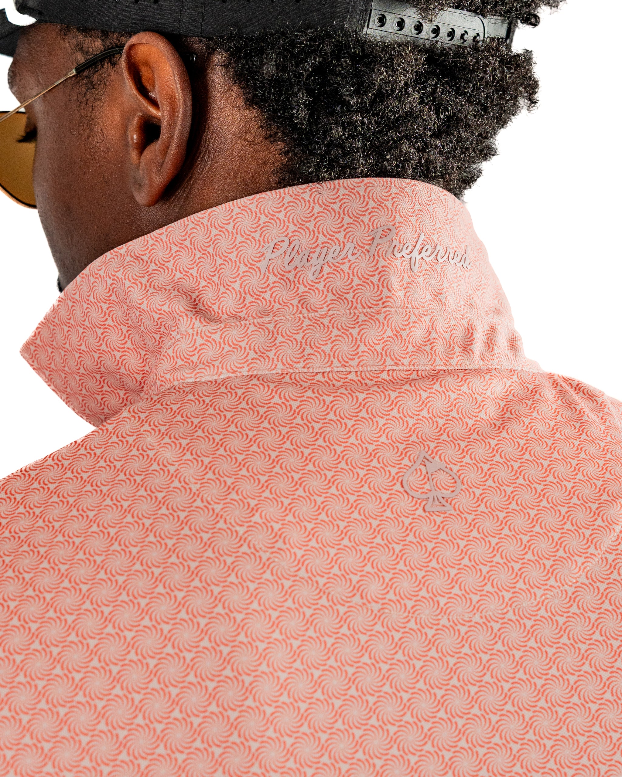 Men's Phoenix Whirl golf shirt featuring a vibrant swirl pattern and a stylish collar, perfect for bold on-course fashion.