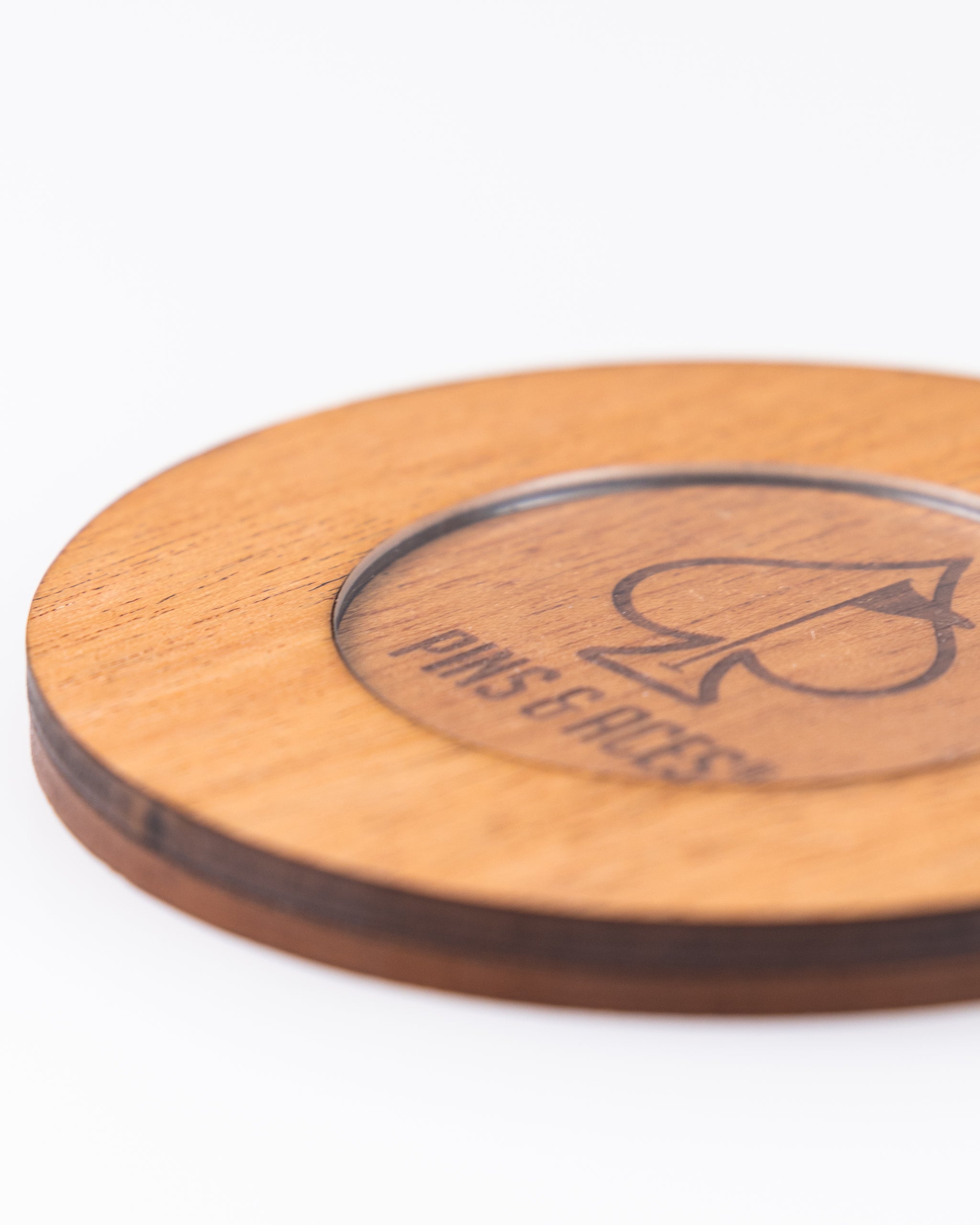 Wooden golf ball marker with engraved "S" logo and "Pittsburgh" text, featuring a metal magnetic ring.