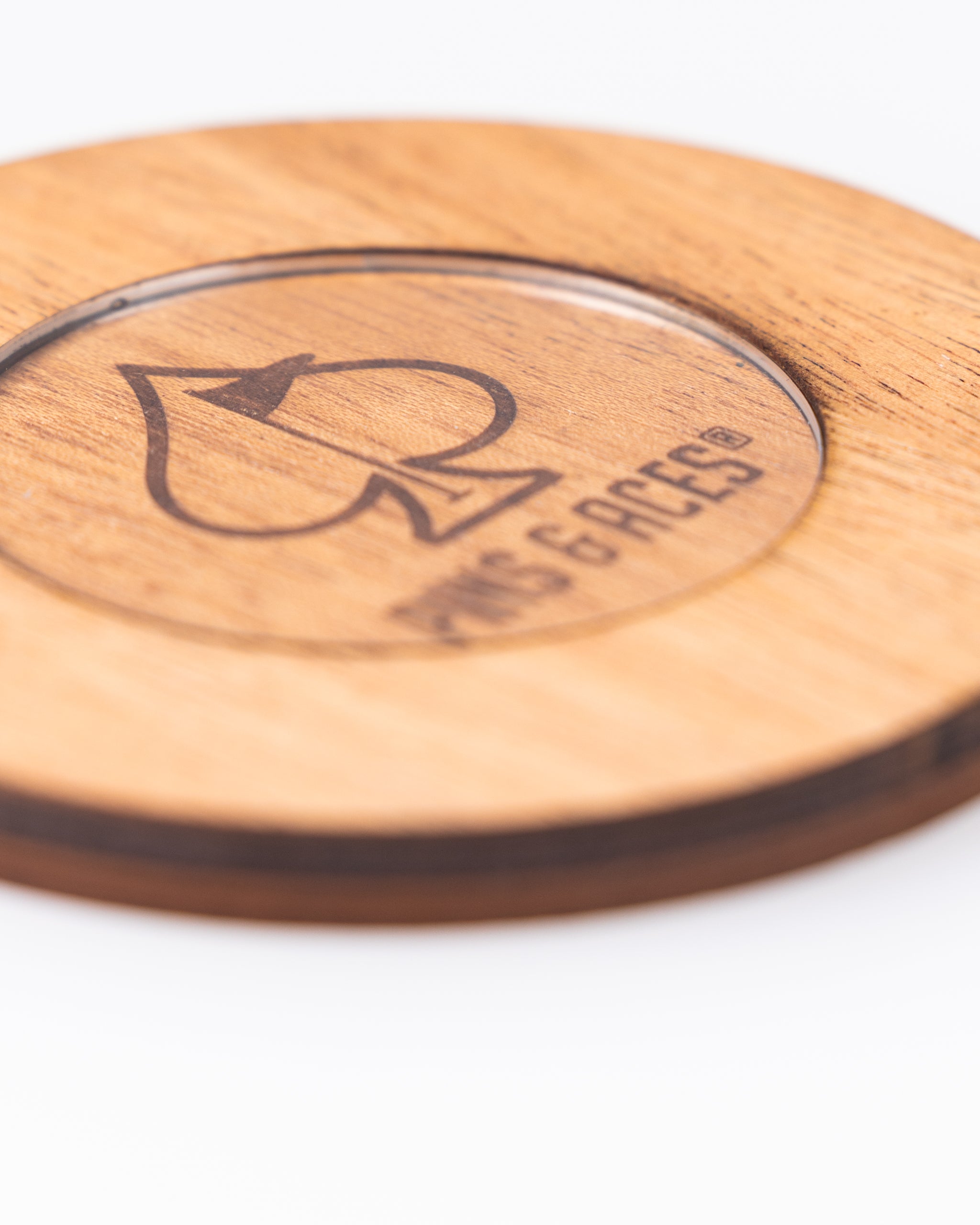 Wooden golf ball marker with a black spade logo and "GOLF ACCESSORIES" text, perfect for bold, unique golf style.