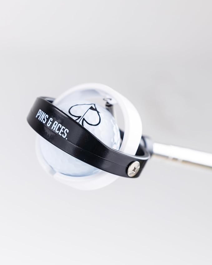 14' ball retriever with a sleek design, featuring a black and white grip and a golf ball securely held in place.