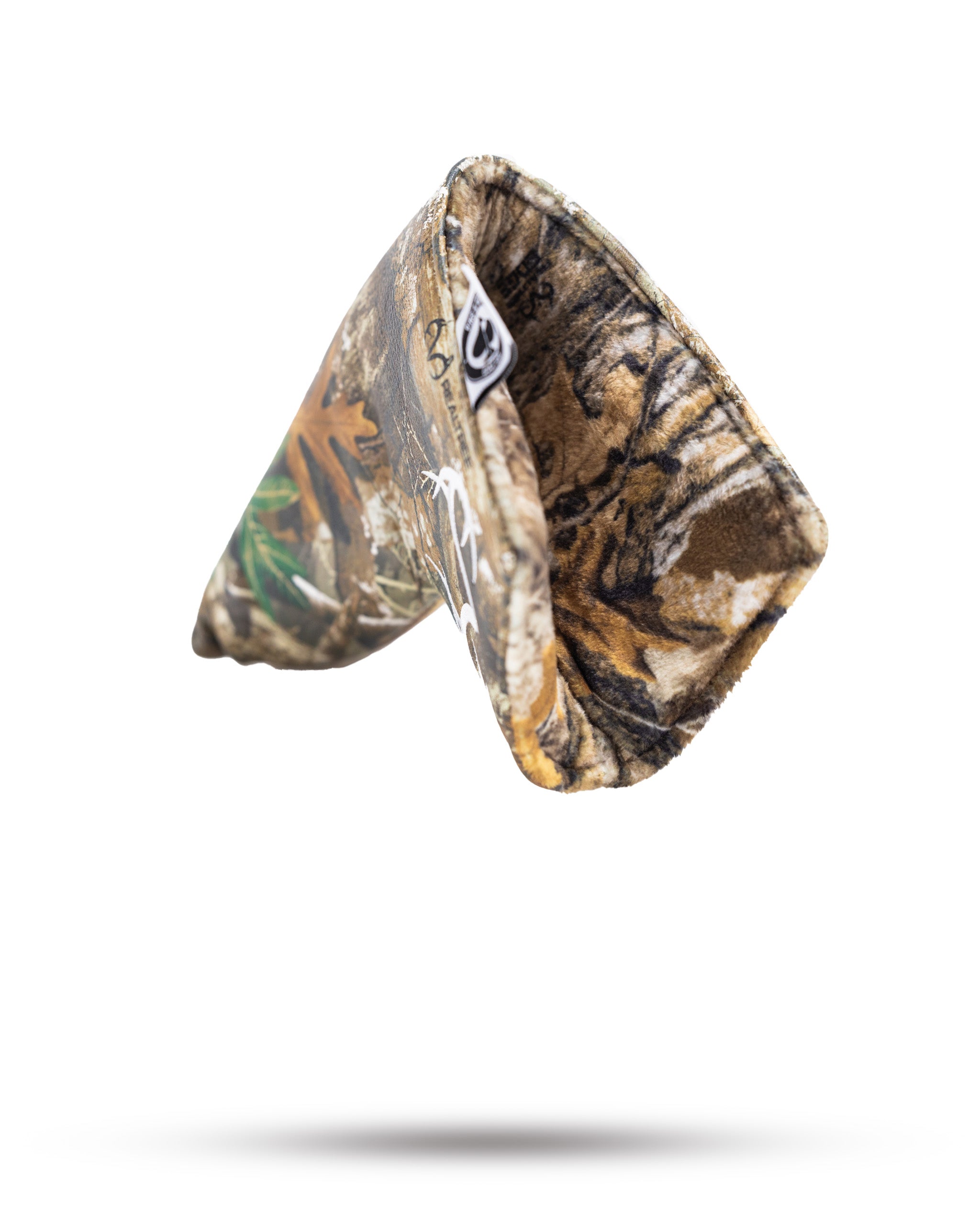 Realtree blade cover featuring a camouflage design, perfect for protecting golf clubs while showcasing a bold style.