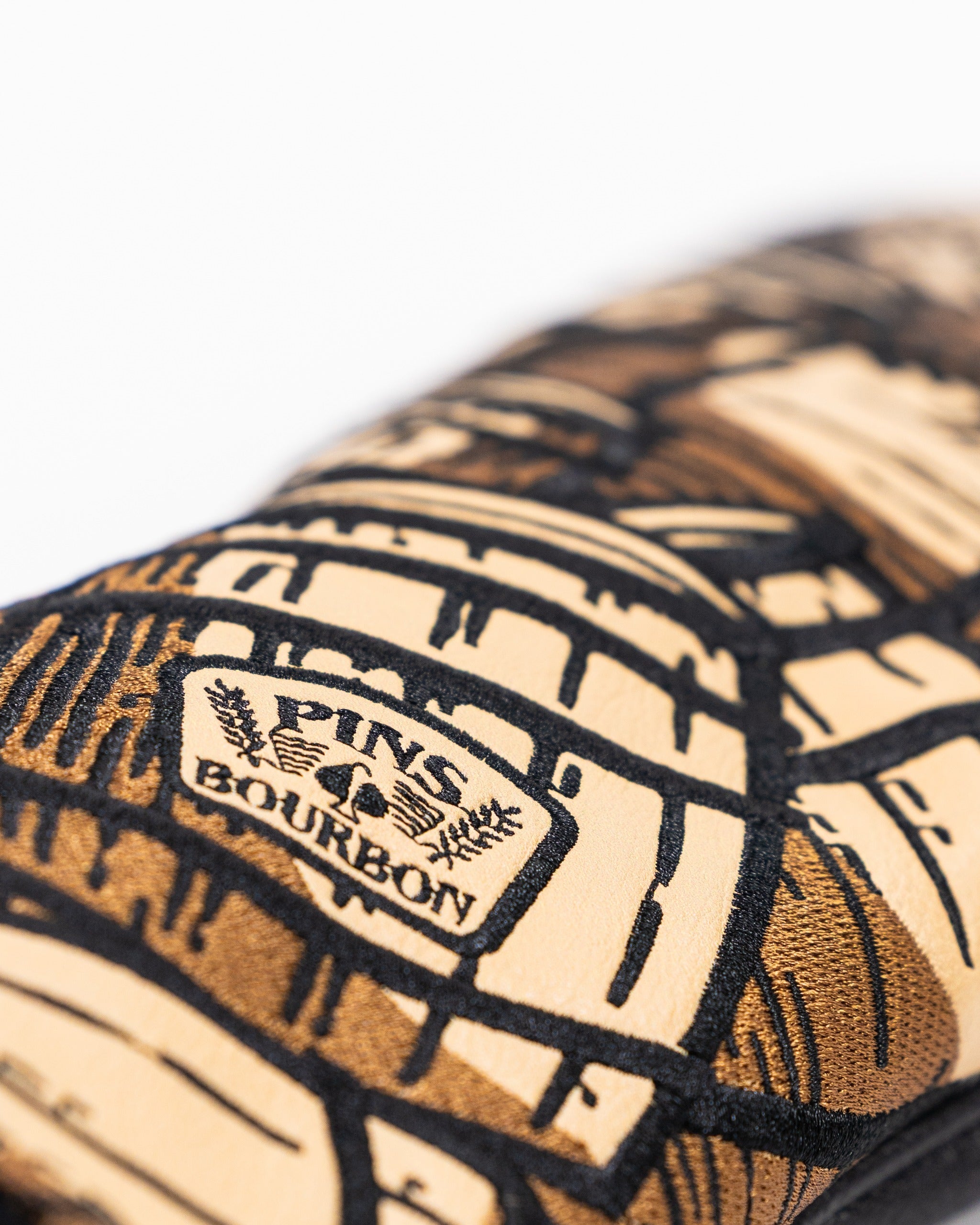Bourbon Barrel Driver Cover featuring a unique wood barrel design and Pins Bourbon logo for stylish golf protection.