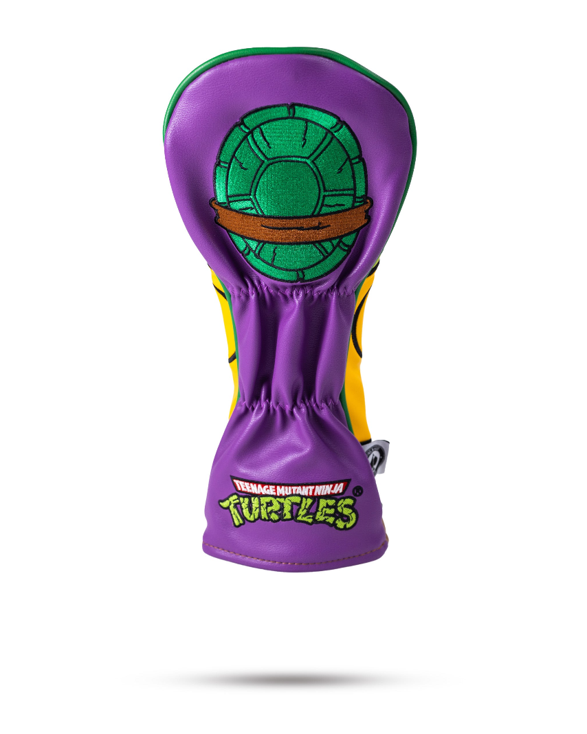Donatello fairway cover featuring a vibrant purple design with a green turtle shell emblem, perfect for golf enthusiasts.