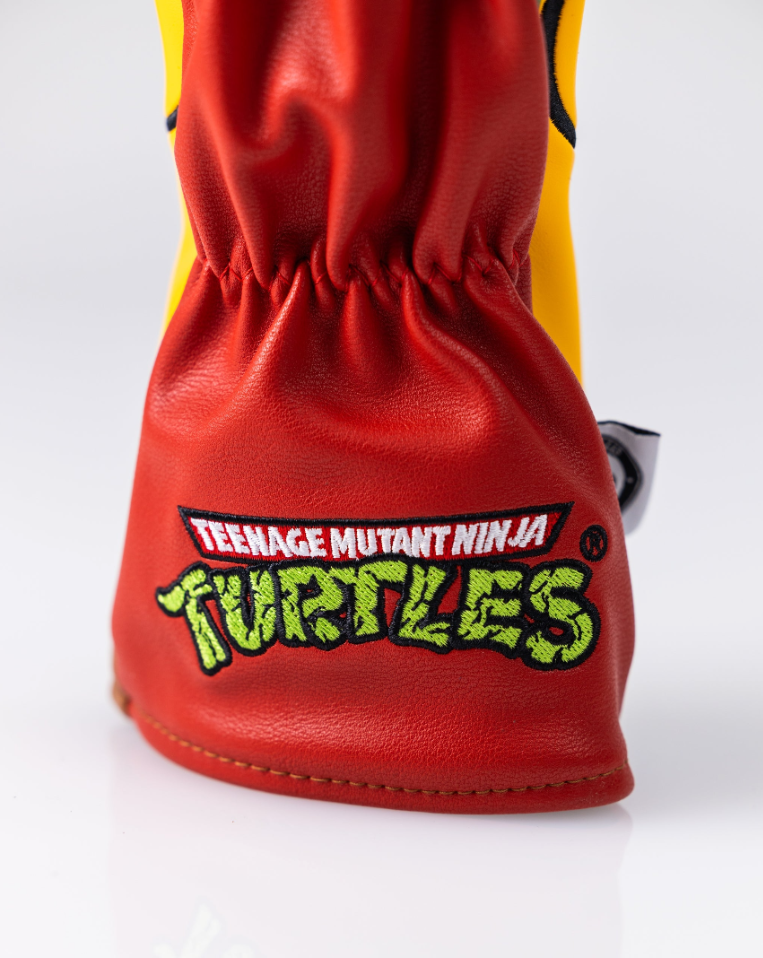 TMNT Raphael hybrid golf cover featuring vibrant colors and iconic Teenage Mutant Ninja Turtles logo.