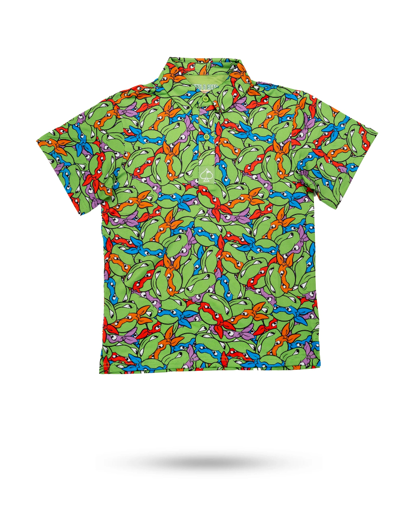 Youth shirt featuring a vibrant all-over print of Teenage Mutant Ninja Turtles in various colors on a green background.