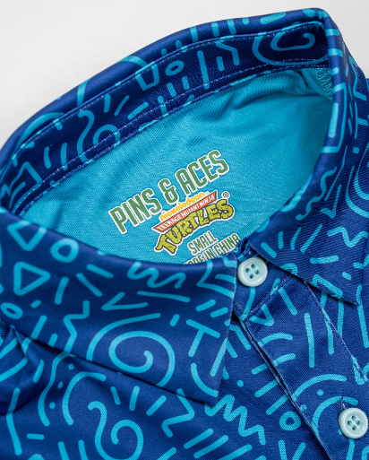 Youth Doodle shirt featuring a vibrant blue design with playful doodles, perfect for young fans of TMNT.