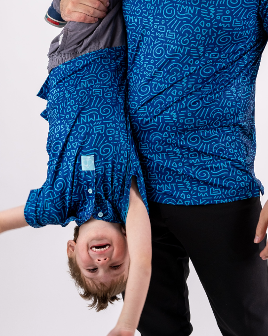 Youth TMNT Doodle shirt featuring a vibrant blue design with playful patterns, perfect for young fans of the franchise.