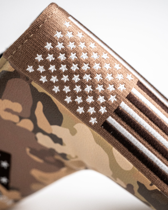Camouflage blade putter cover featuring a detailed American flag design, perfect for patriotic golfers.