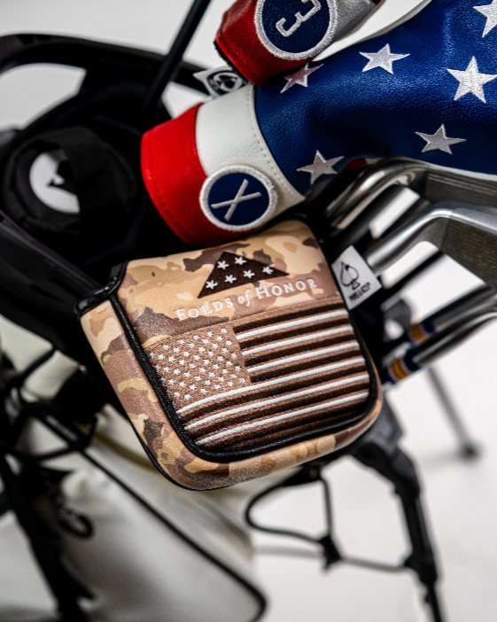 Folds of Honor 2.0 mallet putter cover featuring a camo design and American flag, perfect for patriotic golfers.