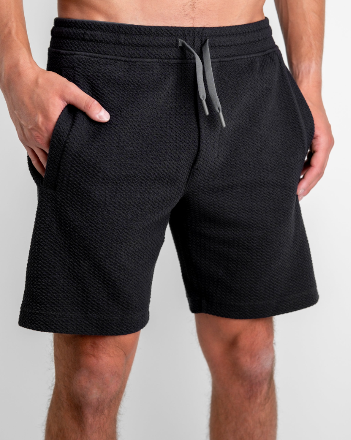 Men's Player Preferred Waffleknit Shorts in Obsidian, featuring a textured fabric, side pockets, and an adjustable waistband.