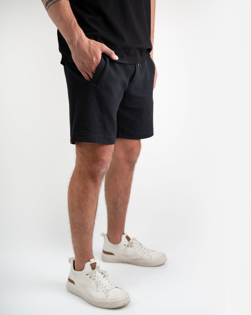 Men's Player Preferred Waffleknit Shorts in Obsidian, featuring a textured fabric and side pockets for comfort and style.