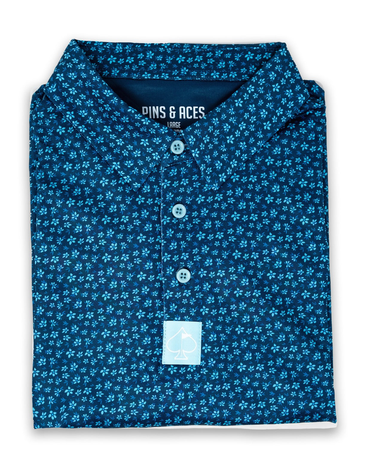 Micro Floral Blue golf polo shirt featuring a dark blue base with small floral patterns, perfect for stylish golfers.