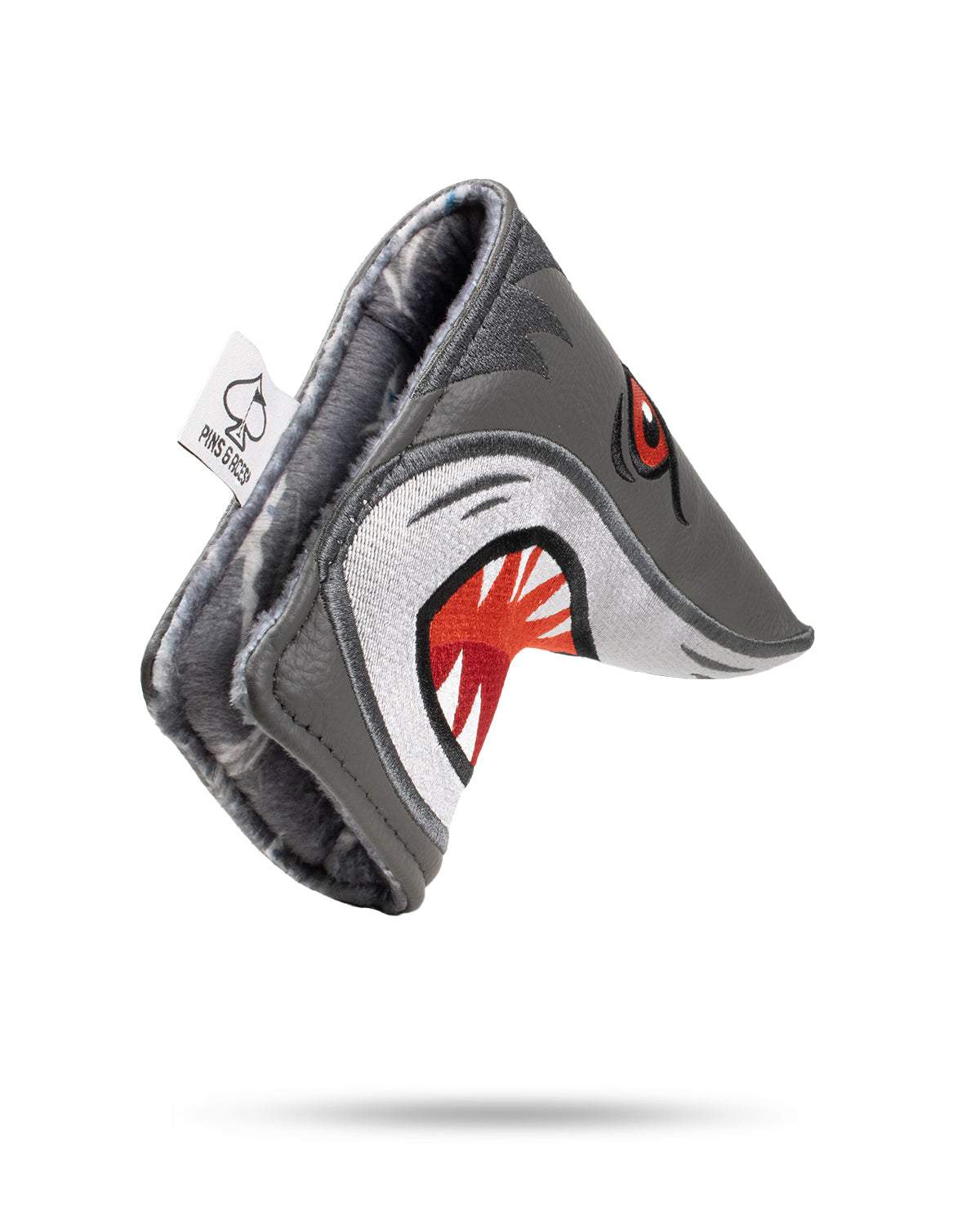 Hammerhead blade putter cover featuring a fierce shark design with a soft interior for protection and style on the golf course.
