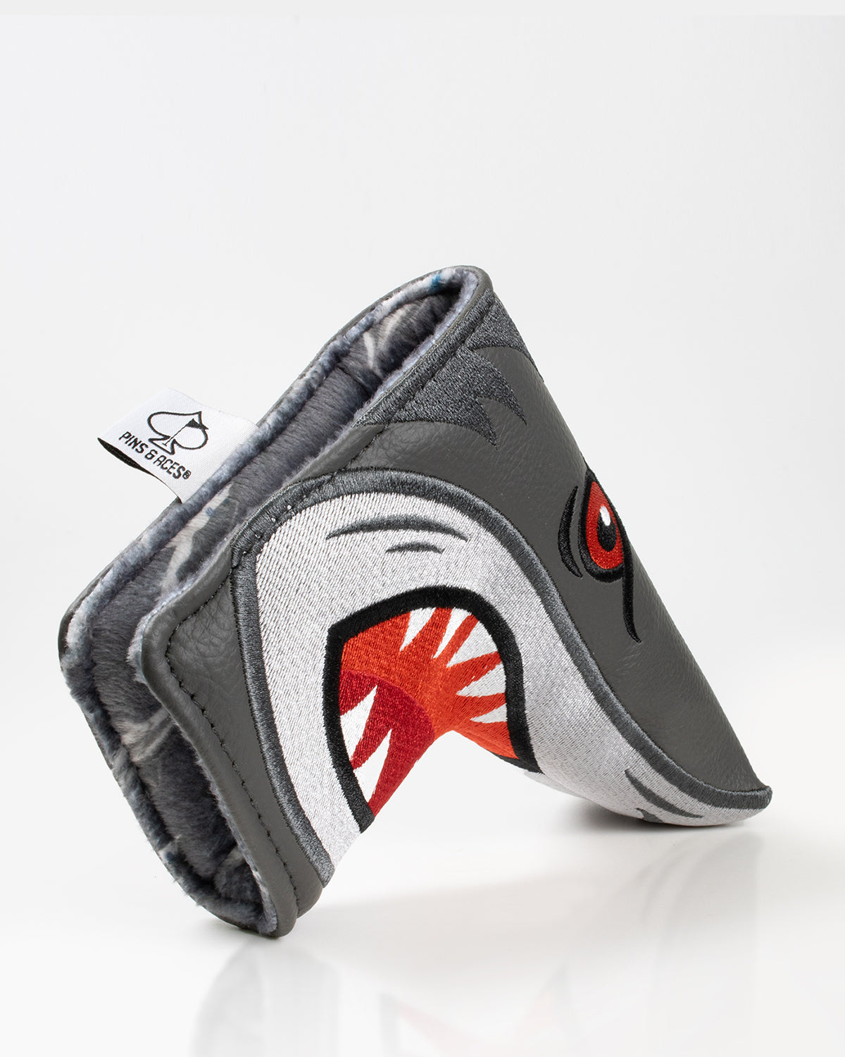 Hammerhead blade putter cover featuring a striking shark design with bold colors and a soft interior for protection.