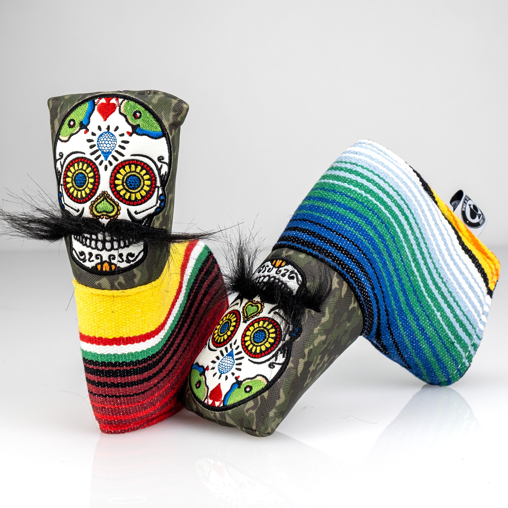 Bold green camo putter cover featuring a mustache sugar skull design with vibrant colors and unique patterns.