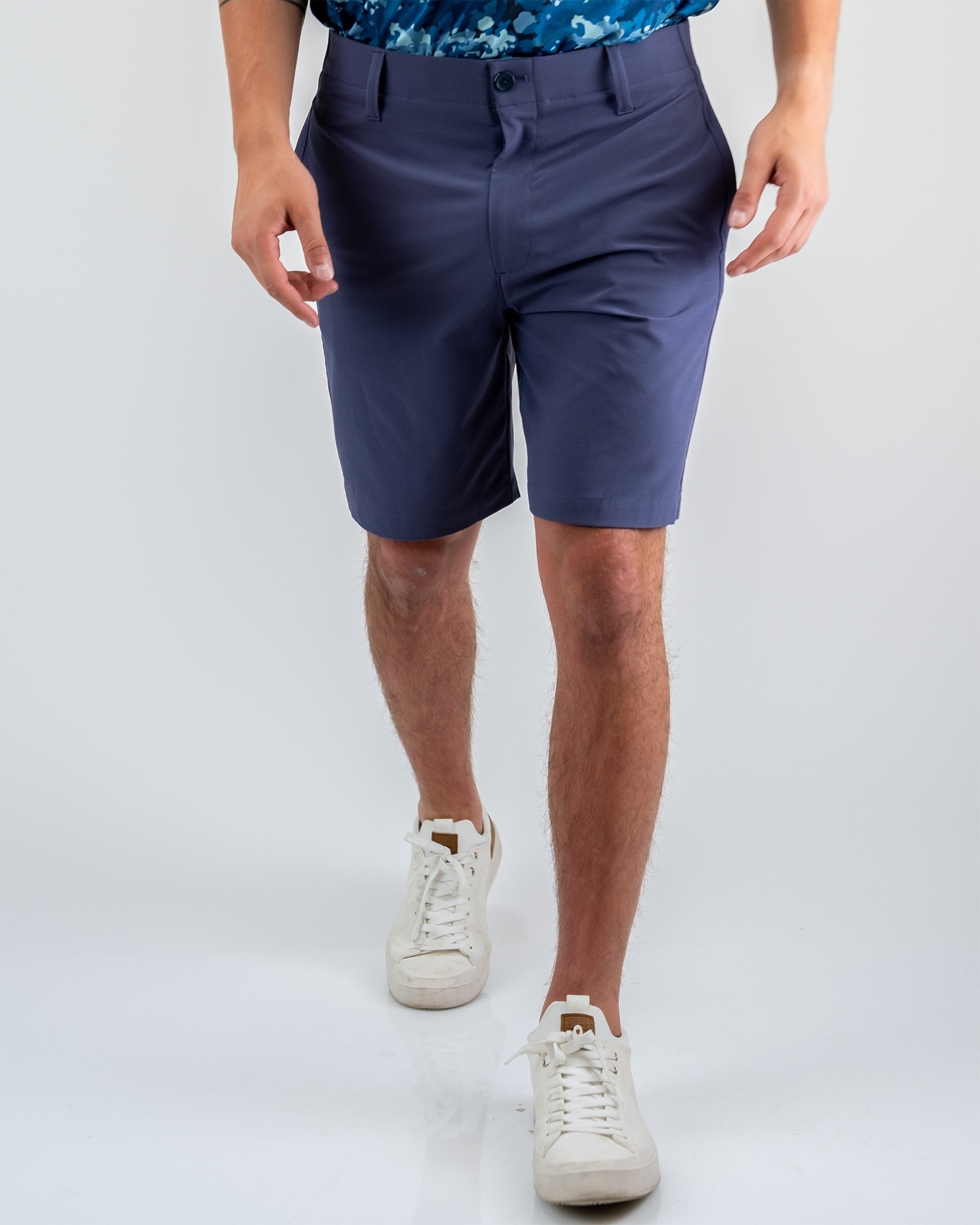 Men's performance shorts in dusk blue, featuring a tailored fit and lightweight fabric, perfect for golf and outdoor activities.