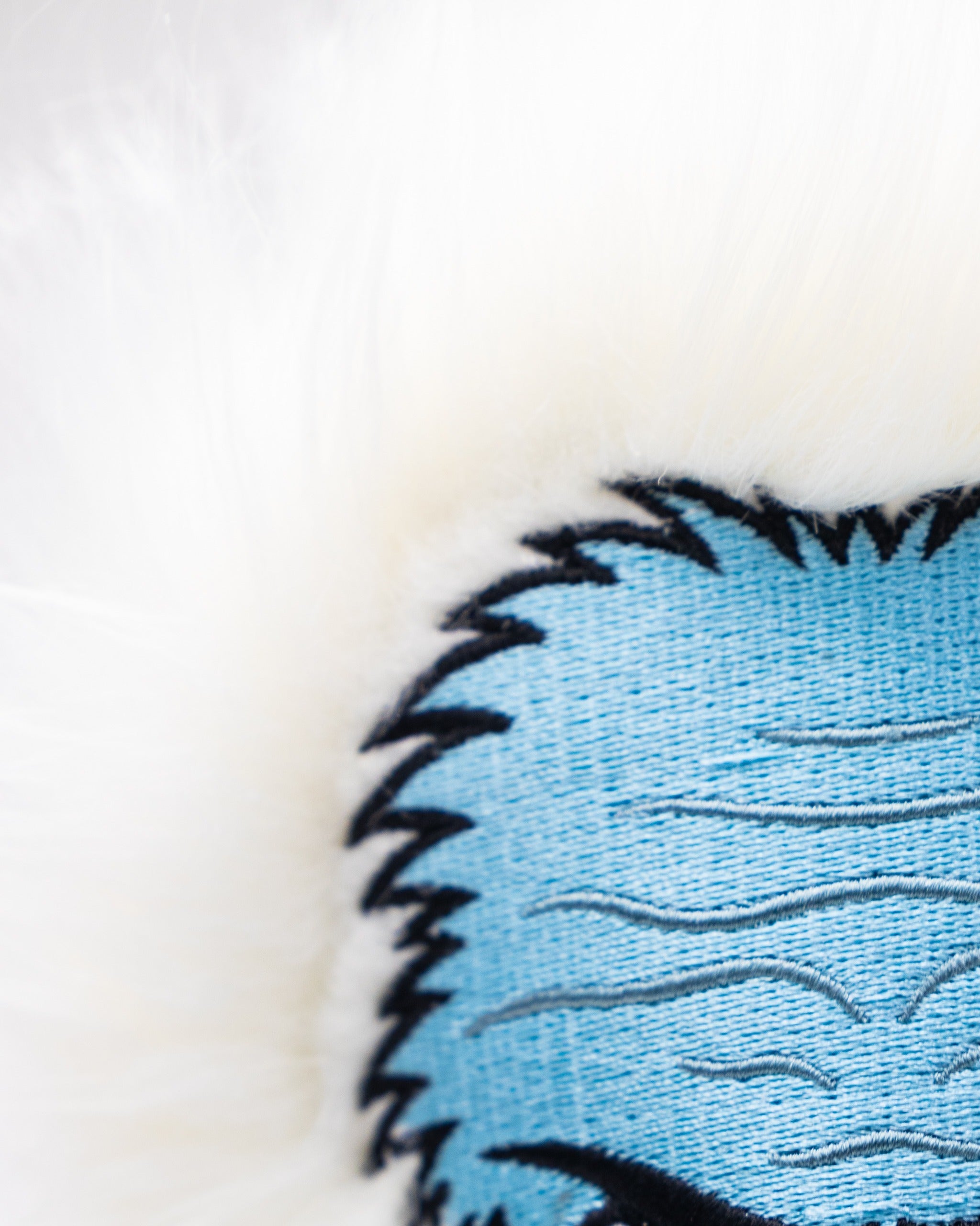 Yeti fairway cover featuring a blue design with white fur accents, perfect for adding style to your golf bag.