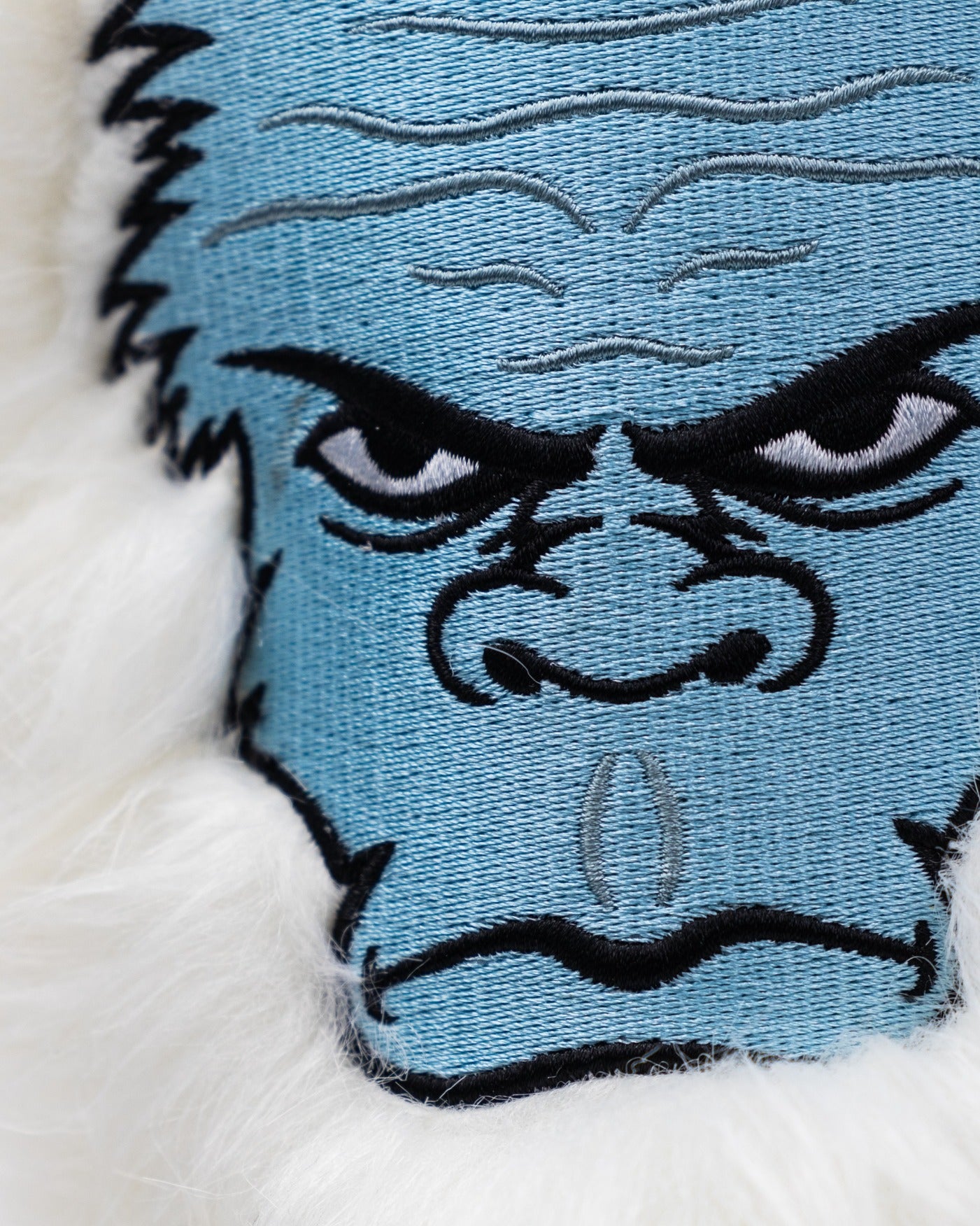 Yeti fairway cover featuring a detailed blue yeti face design with white fur accents for a bold golf accessory.