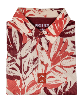 Brushed Floral golf shirt featuring a vibrant leaf pattern in red and cream tones, designed for stylish golfers.