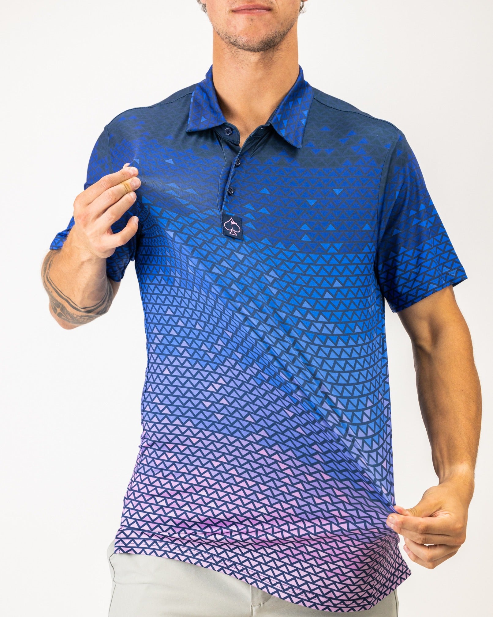 Men's golf polo featuring a digital rainfall pattern in blue and purple shades, designed for a stylish look on the course.