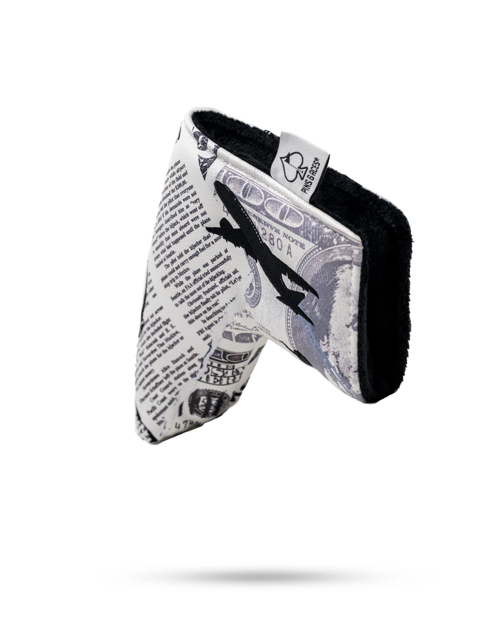D.B. Cooper blade putter cover featuring a unique design inspired by money and mystery, perfect for bold golfers.