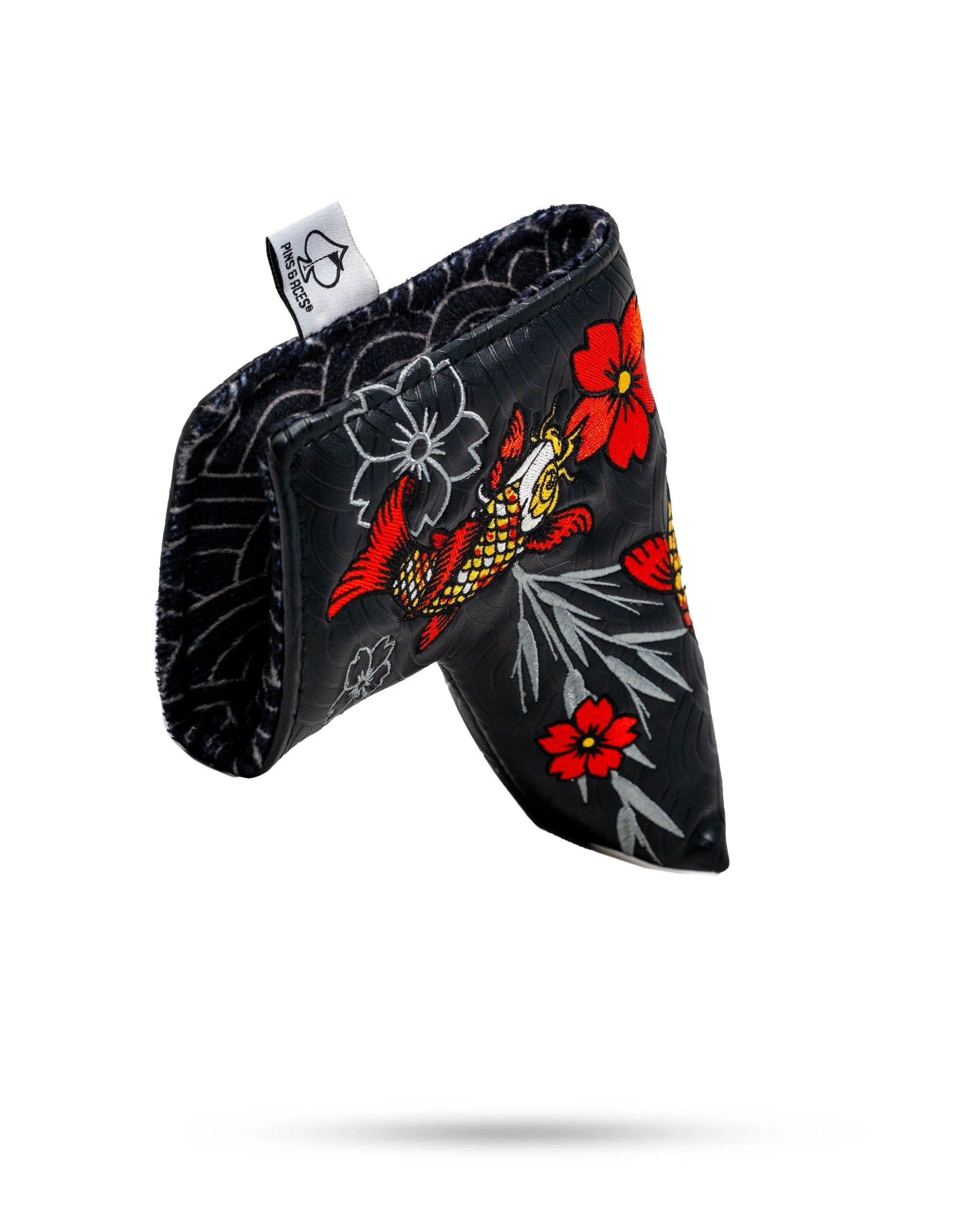 Bold Koi Flow blade putter cover featuring vibrant koi fish and floral designs, perfect for stylish golfers.