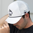 White Performance Spade Hat featuring a perforated design and embroidered logo, ideal for stylish golfers.
