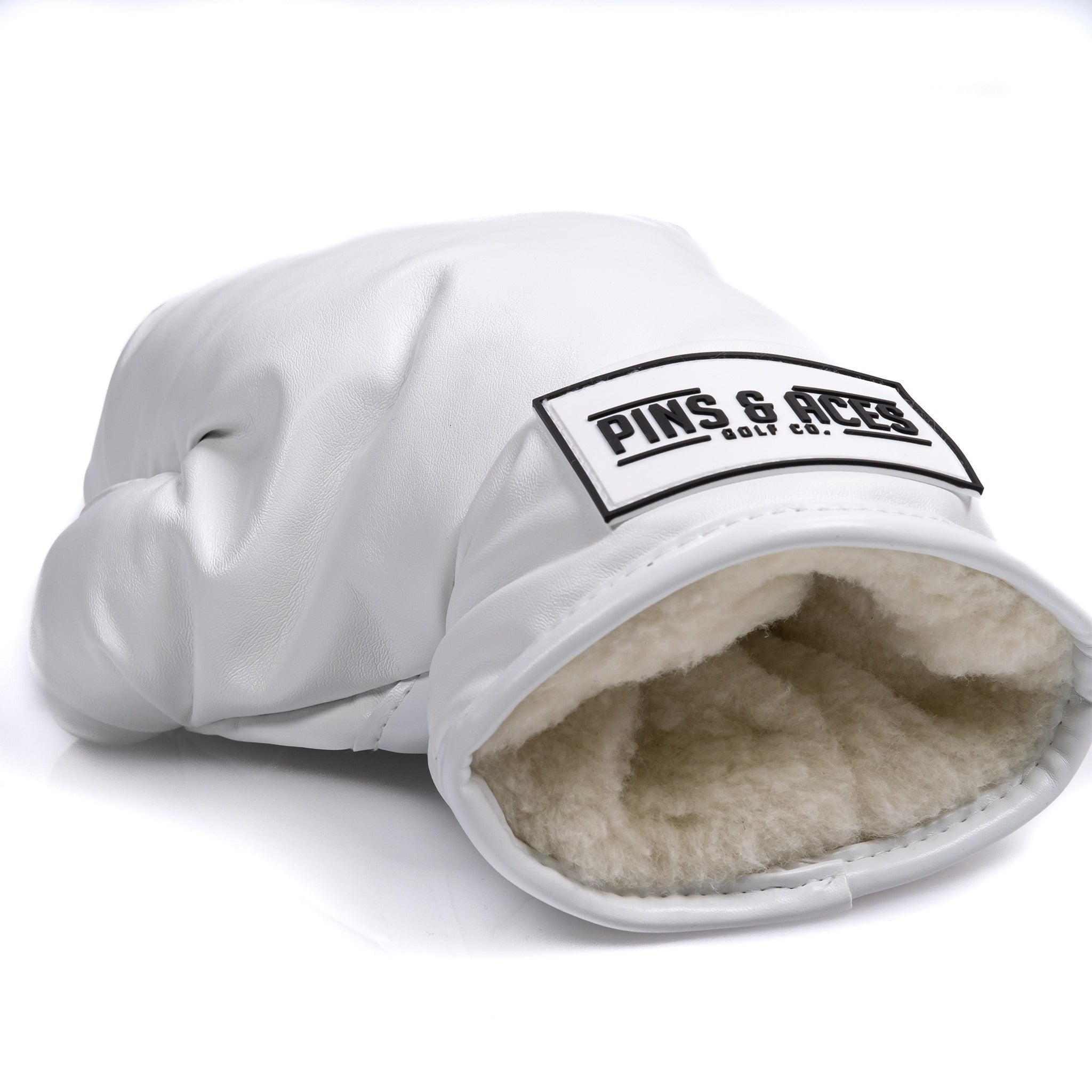 White boxing glove driver cover with soft interior lining, designed for golfers seeking a unique accessory.