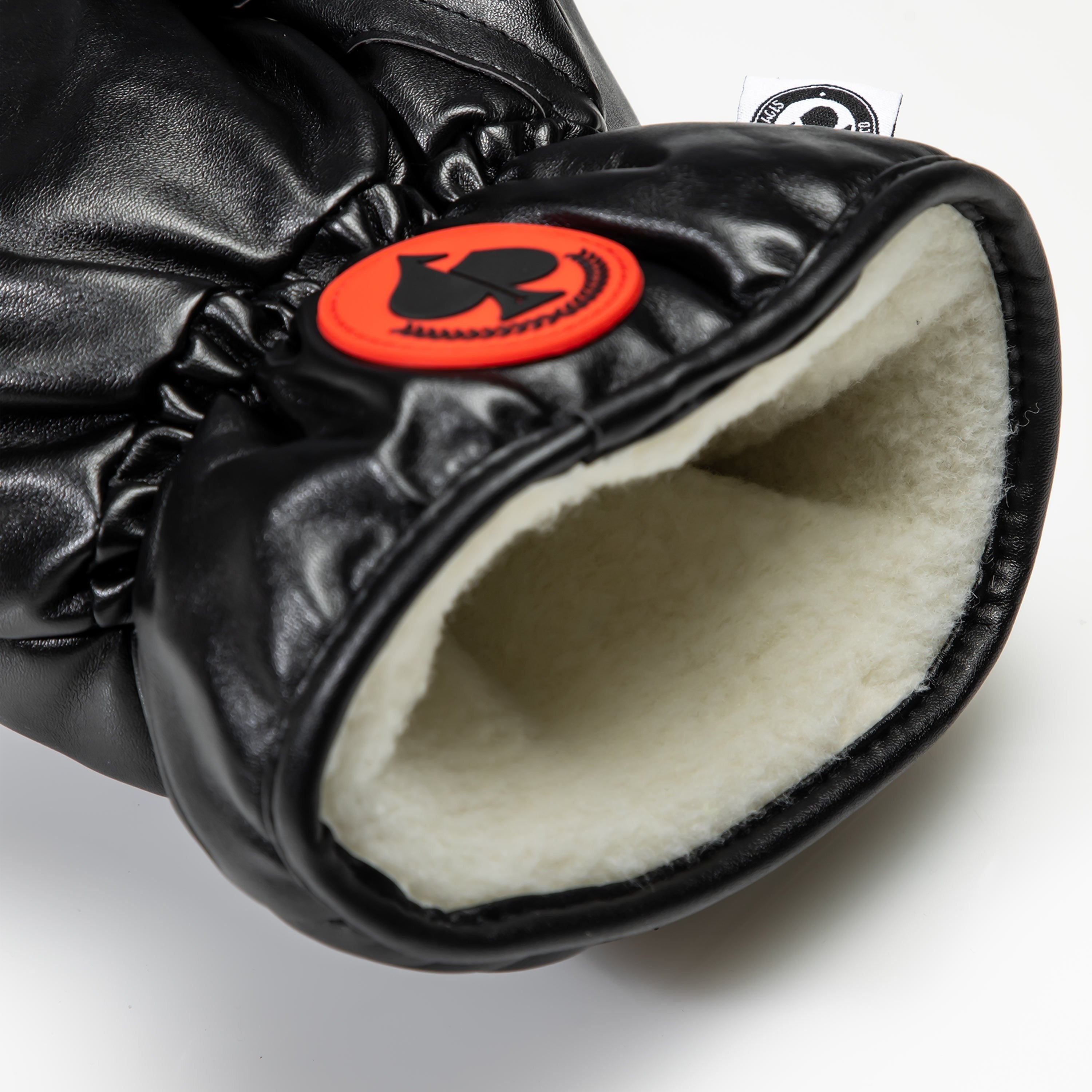 Black boxing glove fairway cover with a soft interior lining, designed to protect golf clubs with style.