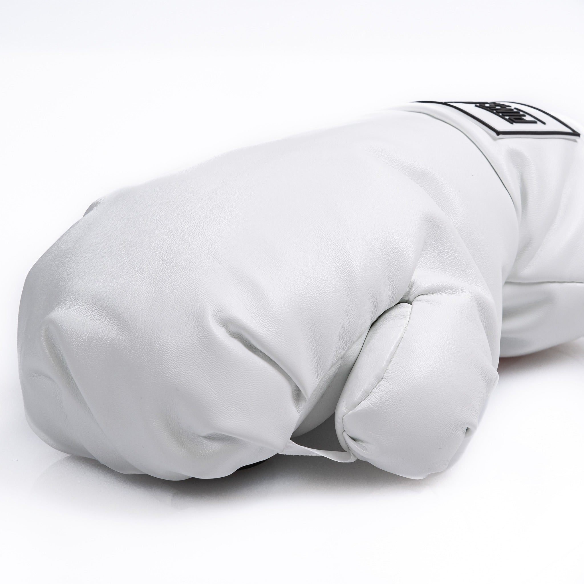 White boxing glove-shaped fairway cover designed to protect golf clubs with a bold and unique style.