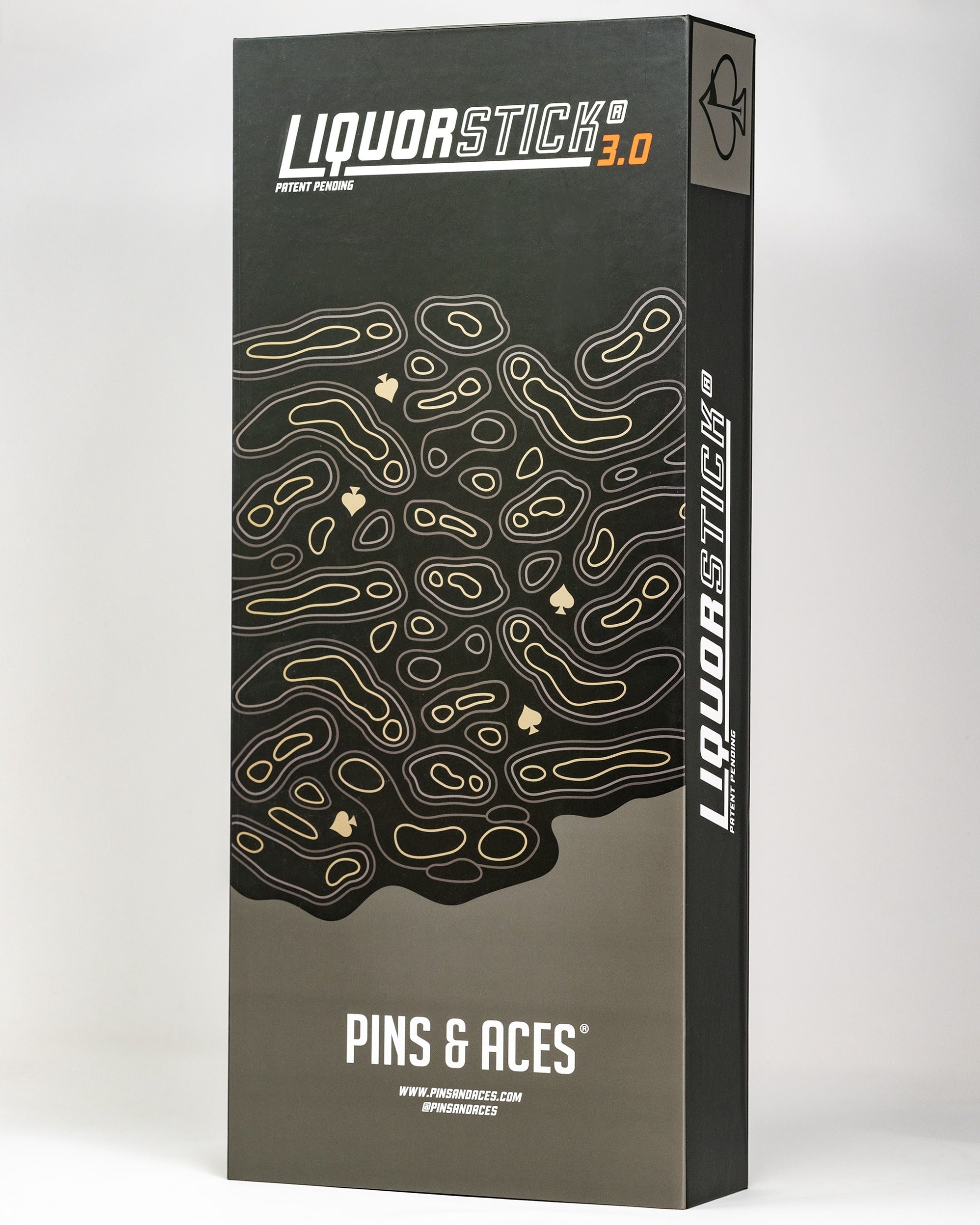 LiquorStick 3.0 in black packaging featuring a wavy design and the Pins & Aces logo, ideal for stylish golfers.