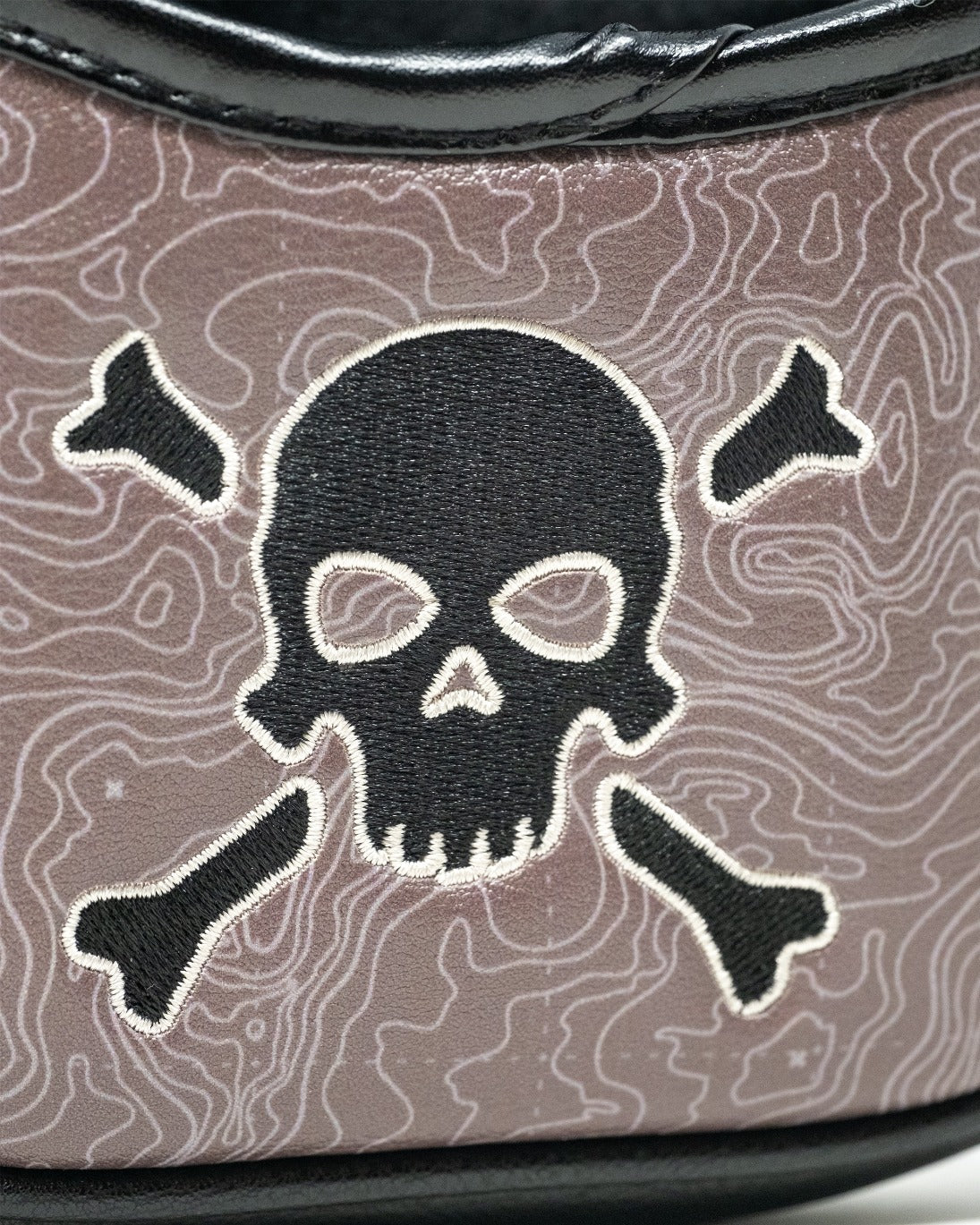 Bold mallet putter cover featuring a skull and crossbones design on a textured background, perfect for standout golfers.