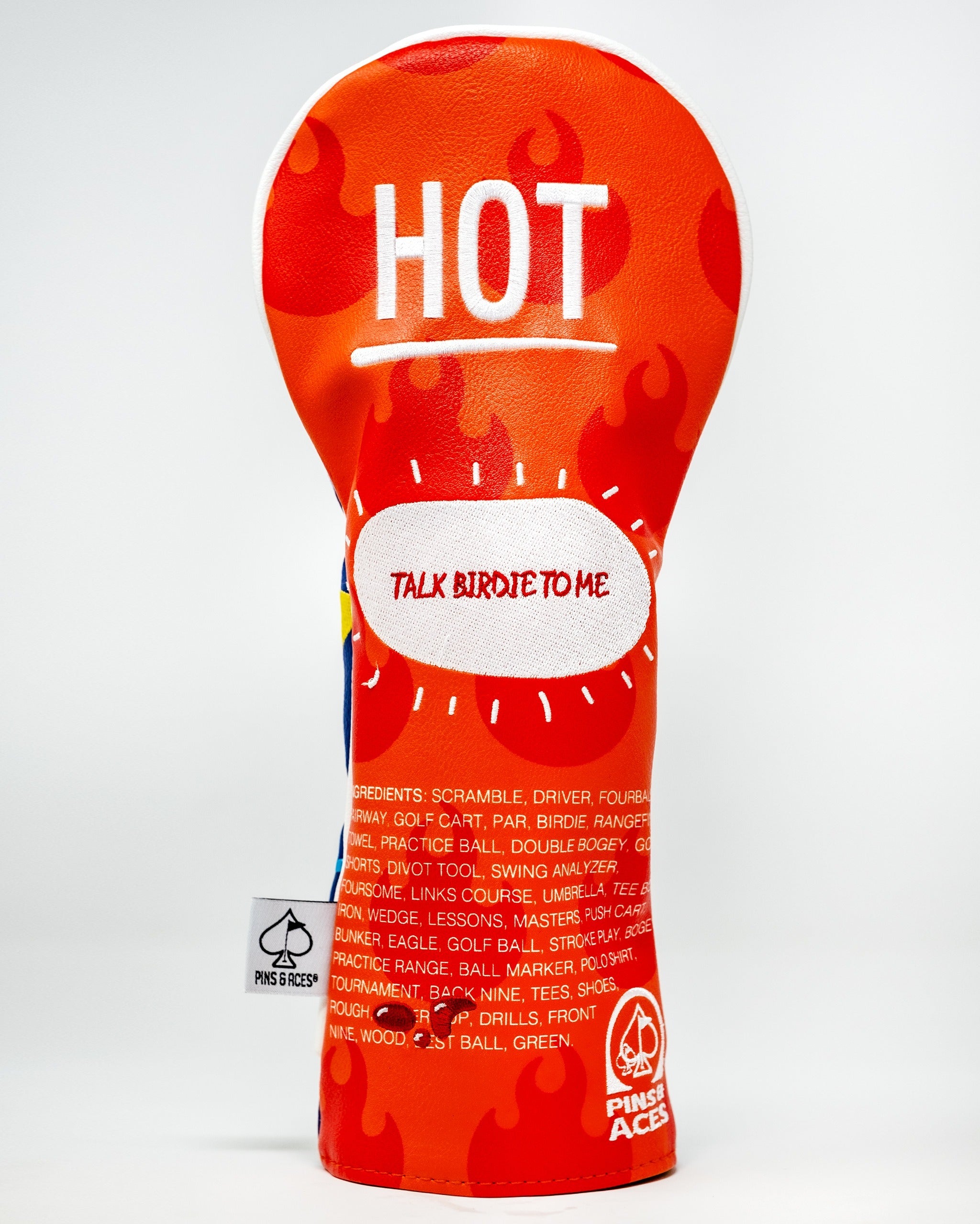 Bold golf headcover featuring a fiery hot sauce design with the phrase "Talk Birdie to Me" for a fun, standout look on the course.