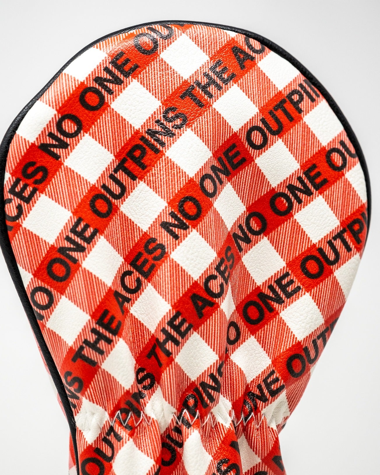 Bold red and white checkered fairway cover featuring a unique design, perfect for golfers wanting to stand out on the course.